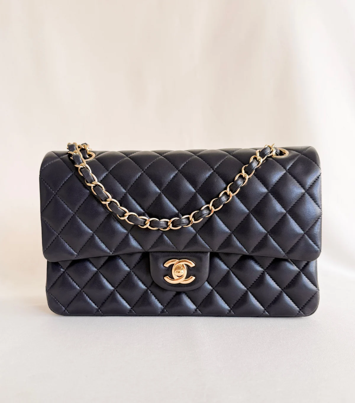 chanel classic flap black lambskin gold hardware front view
