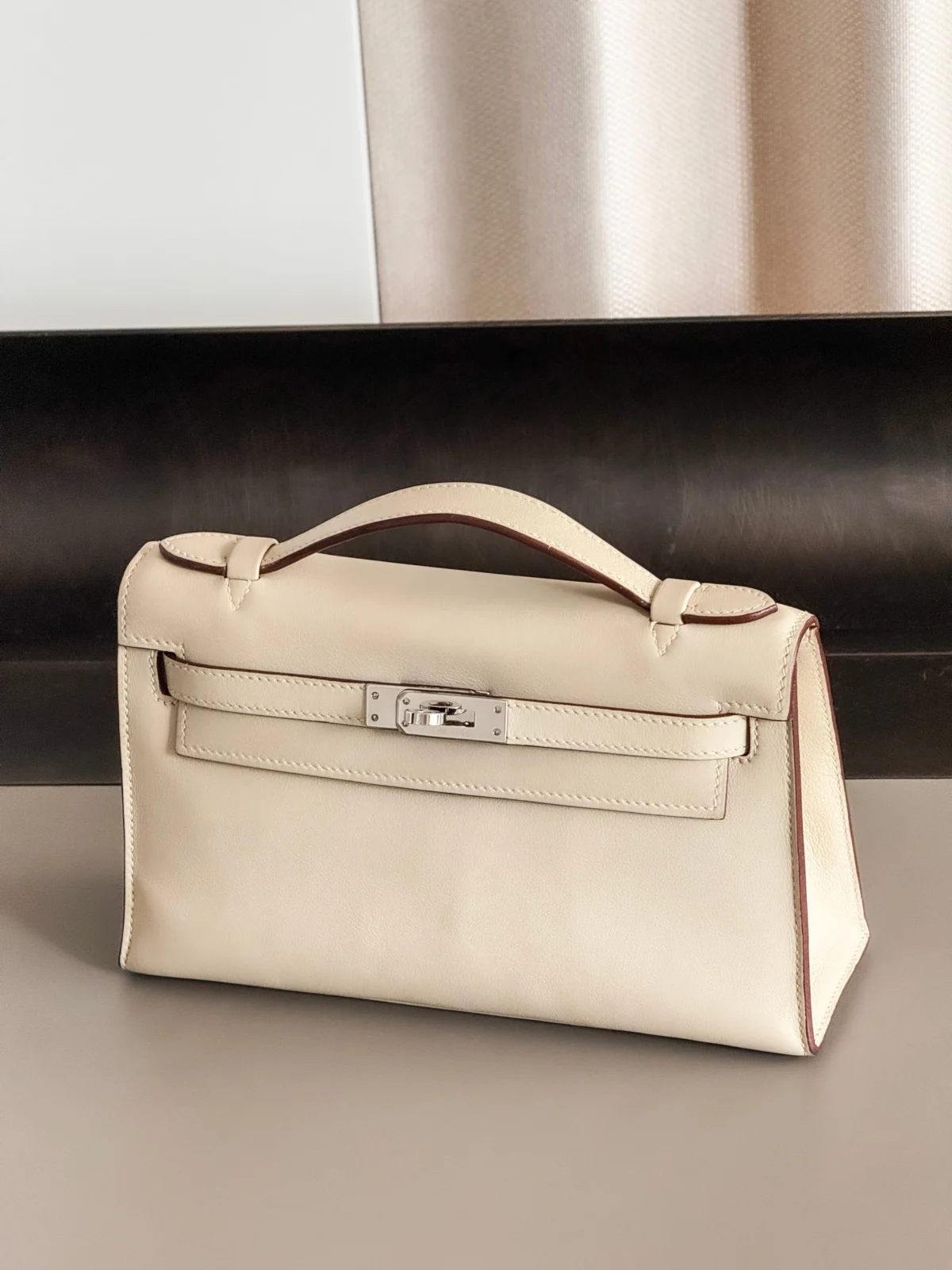 Authentic pre-owned Hermès Kelly Pochette bags