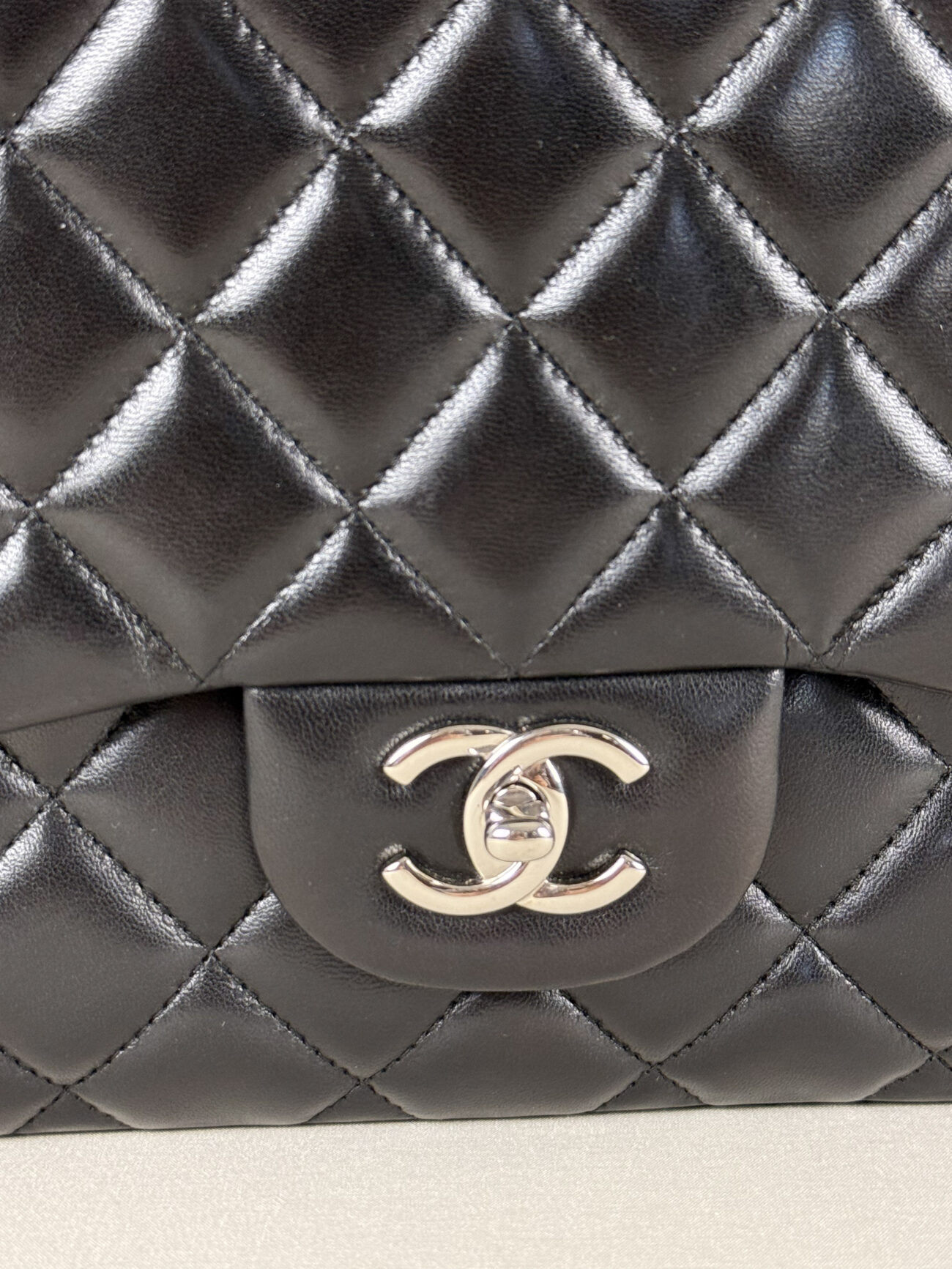 Chanel Maxi Single Flap bag black lambskin leather with palladium hardware CC turn lock and dimond quilting detail