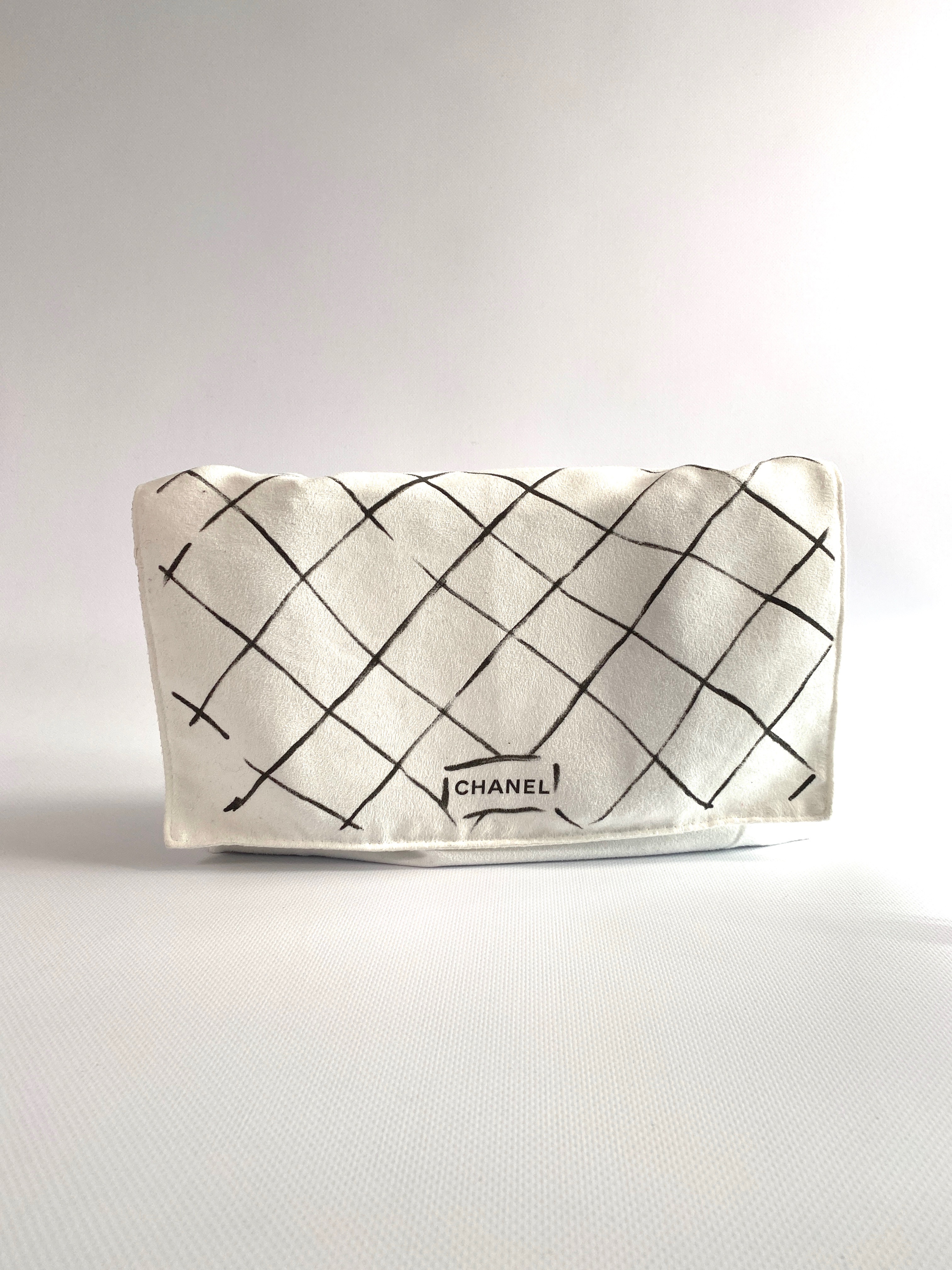 chanel protected storage cover with quilting pattern