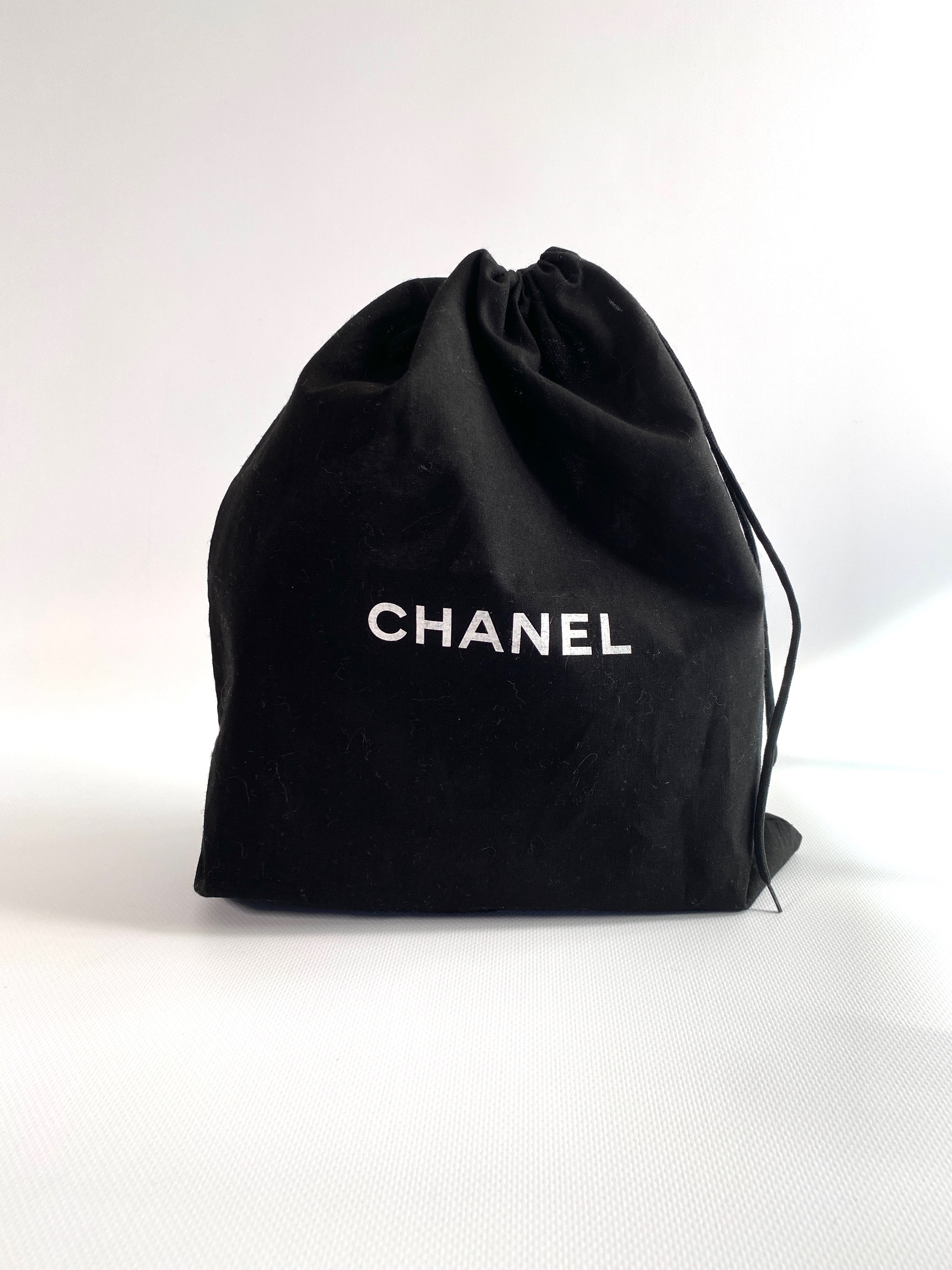 chanel black dustbag with logo