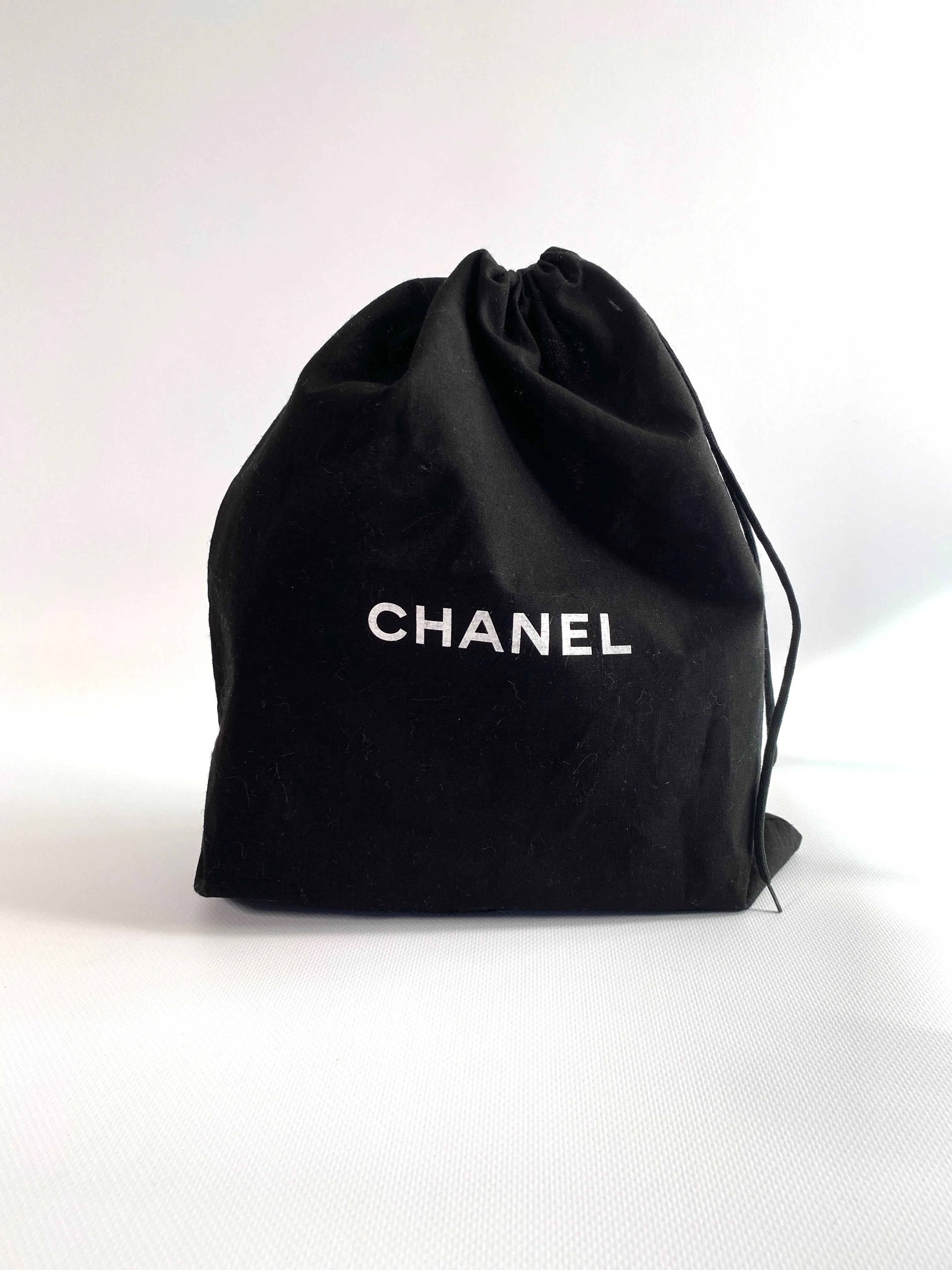 chanel black dustbag with logo