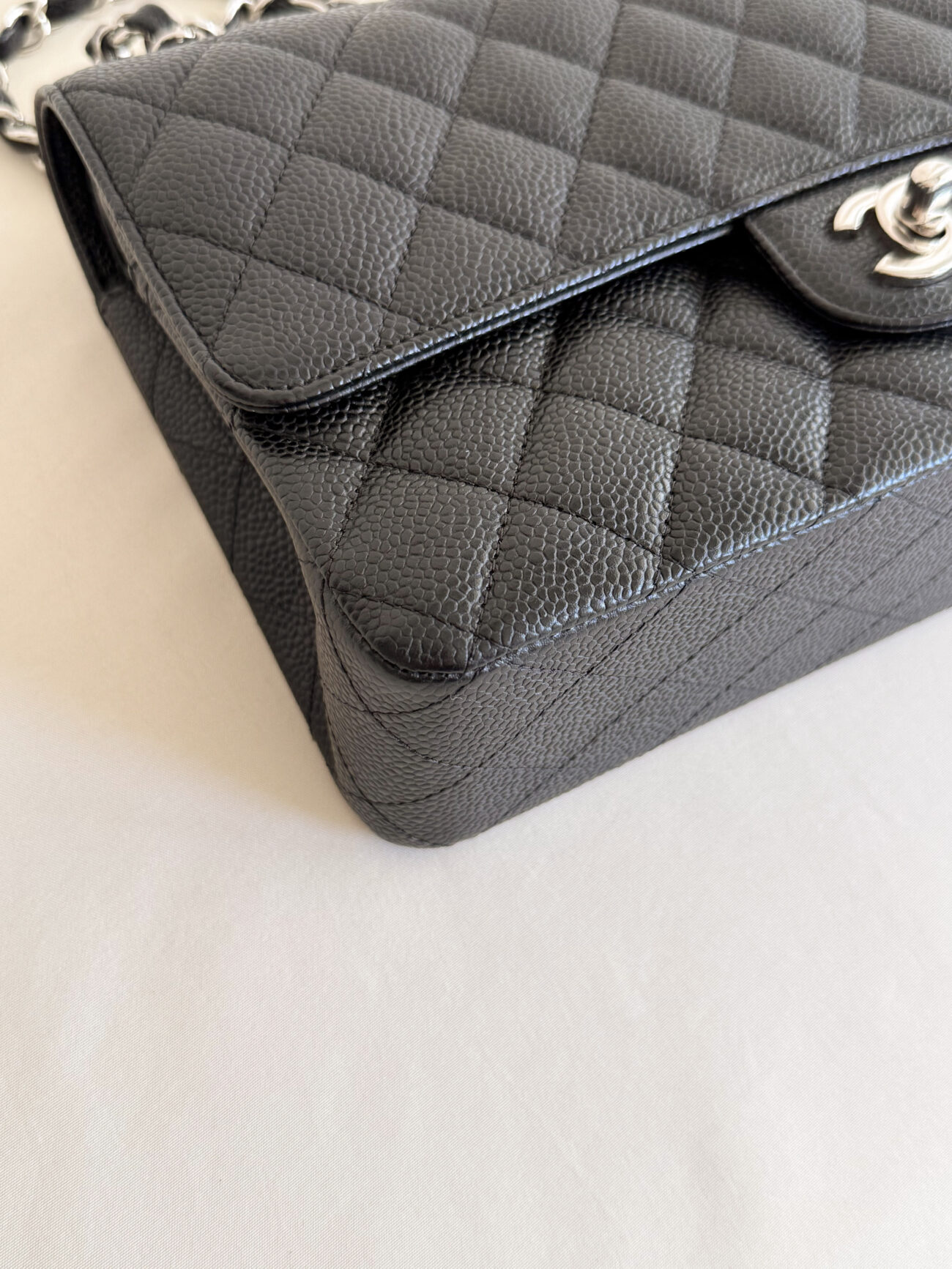 chanel classic flap black caviar leather corners condition detail