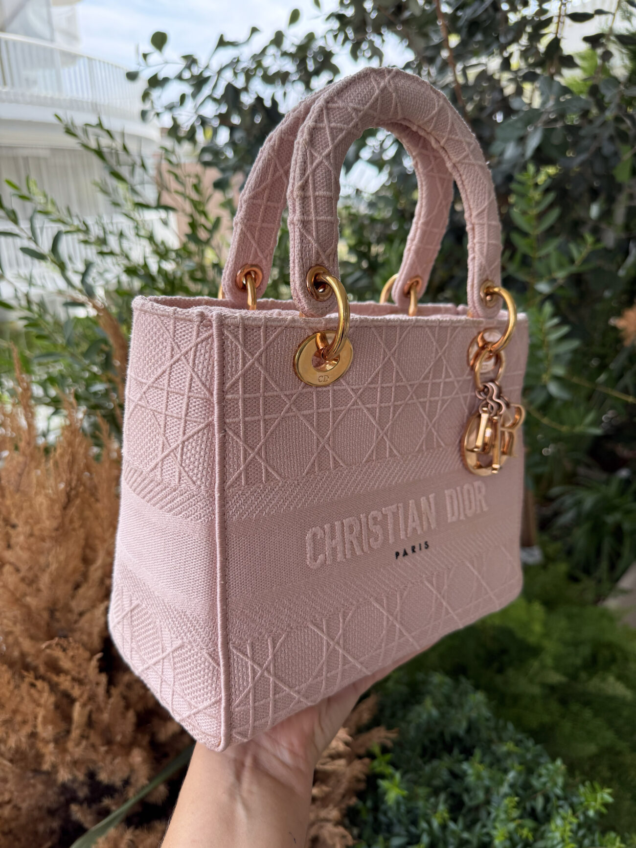 Lady Dior D-Light Small Pink Embroidered Canvas three-quarter view