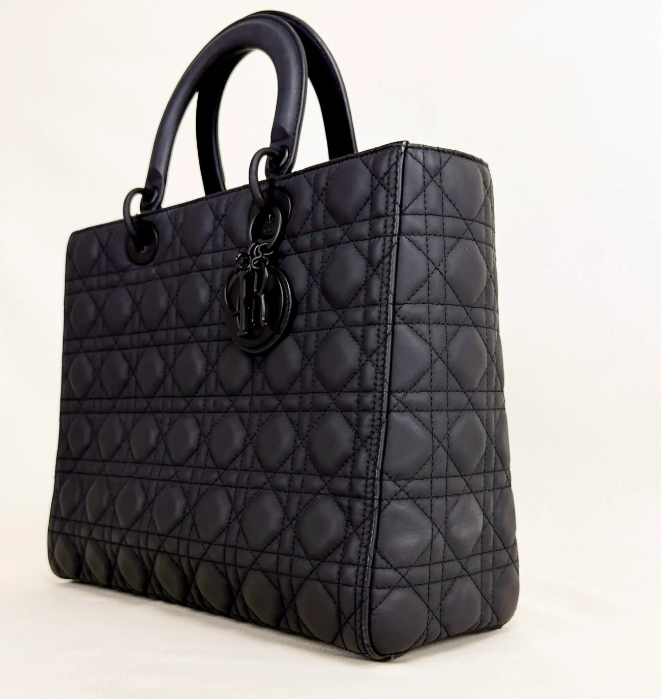 Lady Dior large ultra matte black bag angled front view