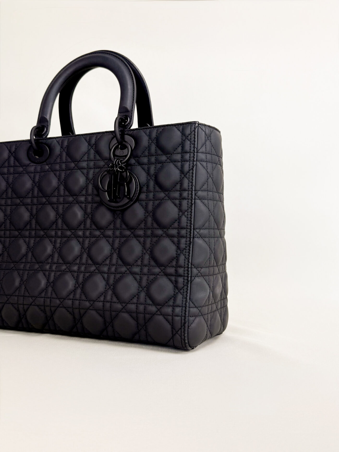 Lady Dior large ultra matte black bag angled front view