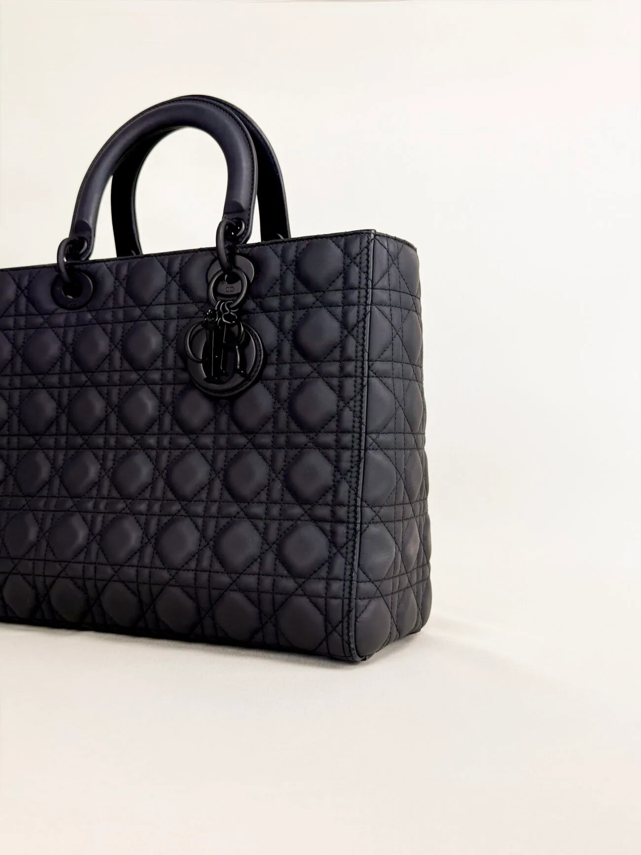 Lady Dior large ultra matte black bag angled front view