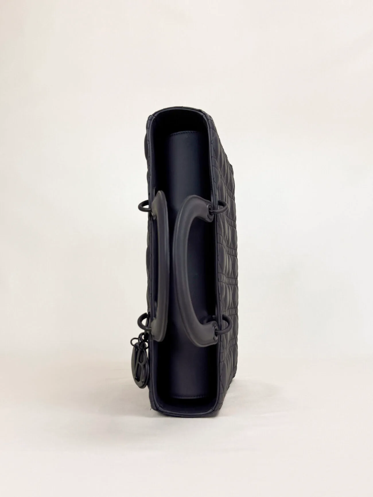 Lady Dior large ultra matte black bag handle and flap detail