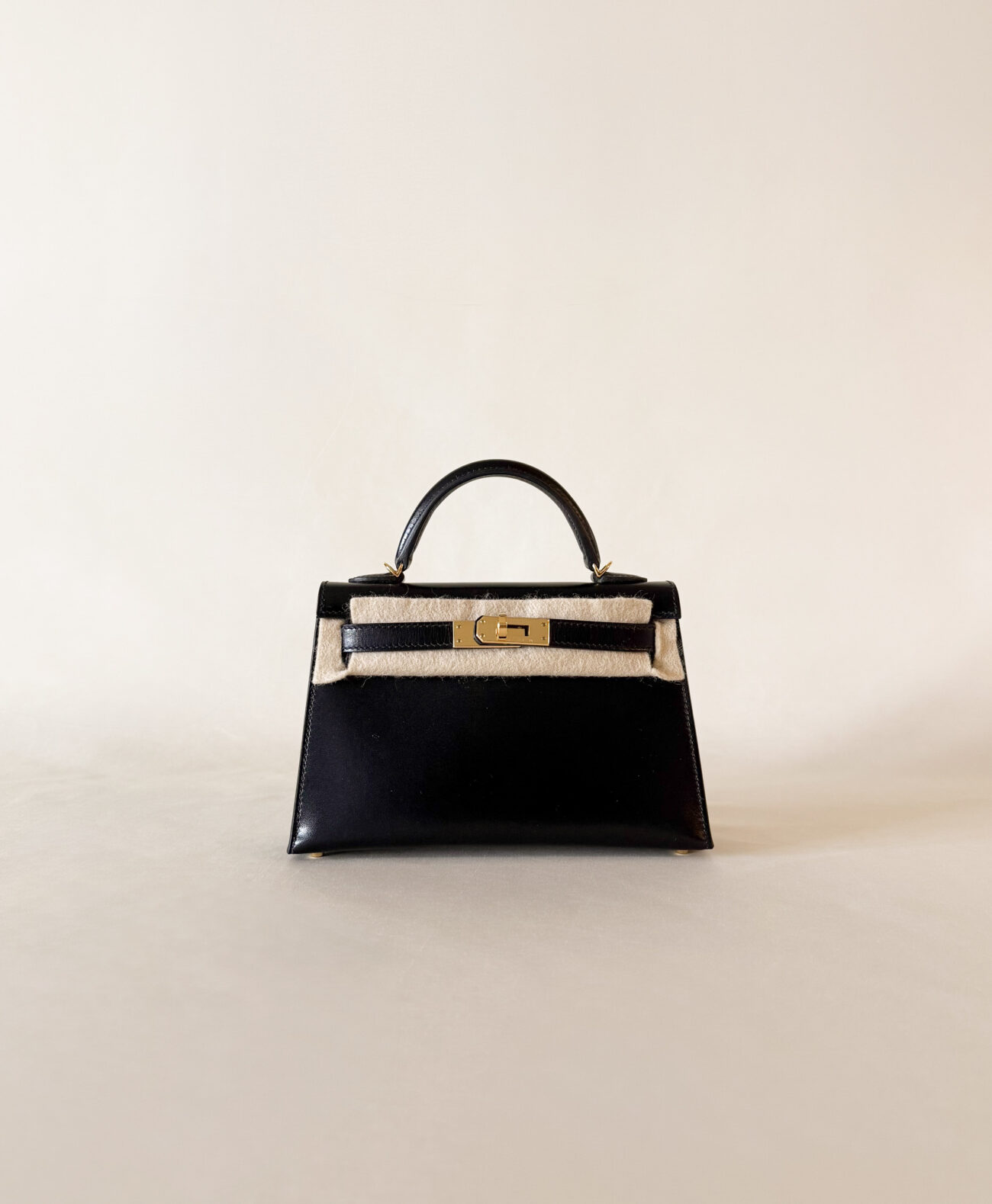 Hermès Mini Kelly box black leather with gold hardware front view