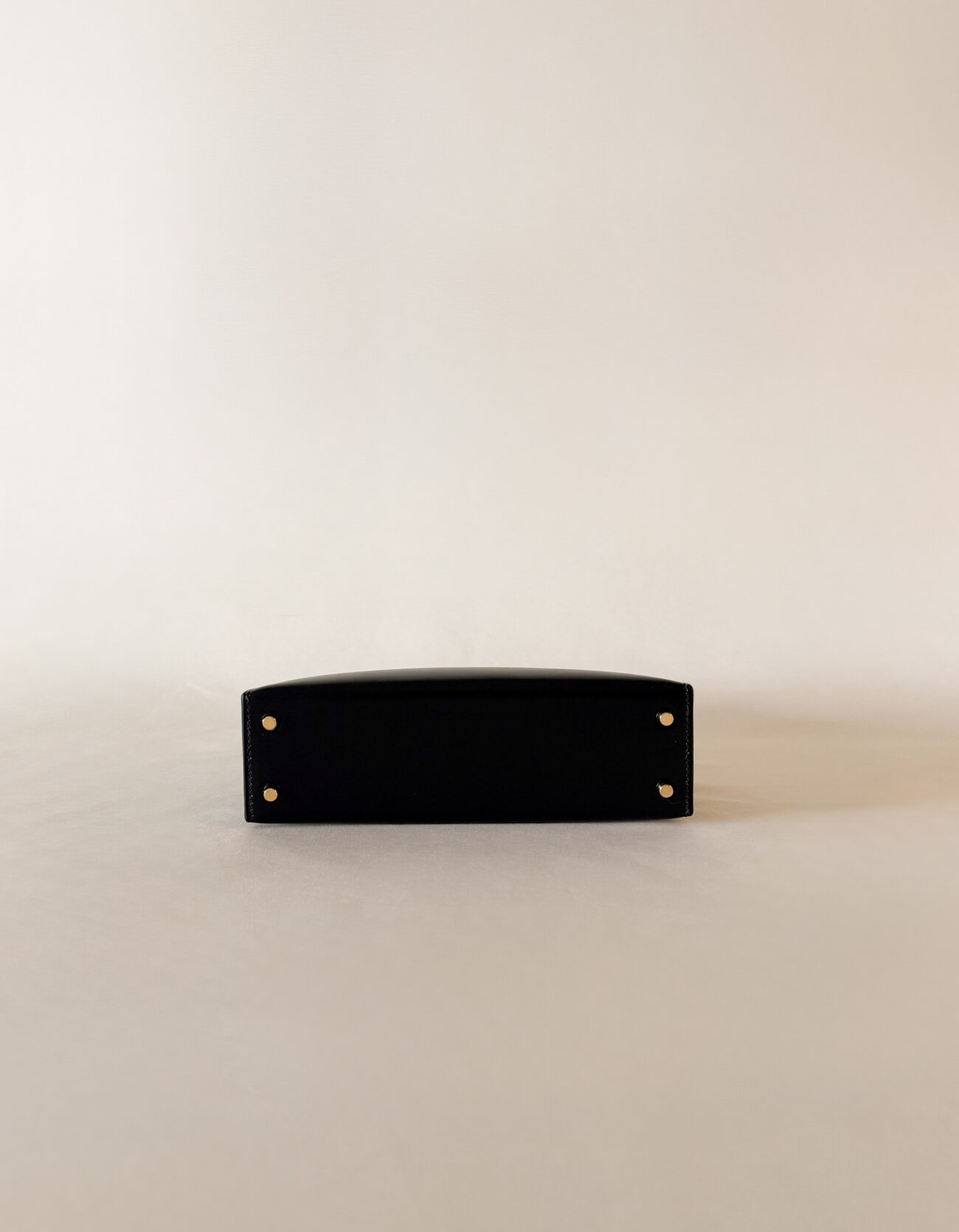 Hermès Mini Kelly box black leather with gold hardware bottom view