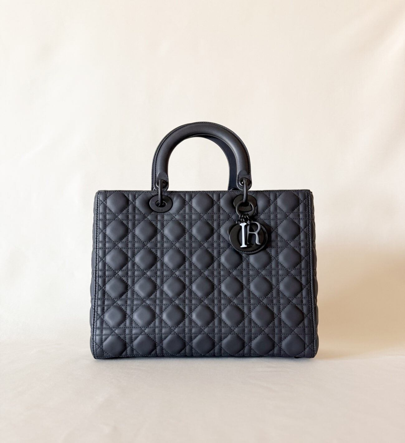 Lady Dior large ultra matte black bag front silhouette view