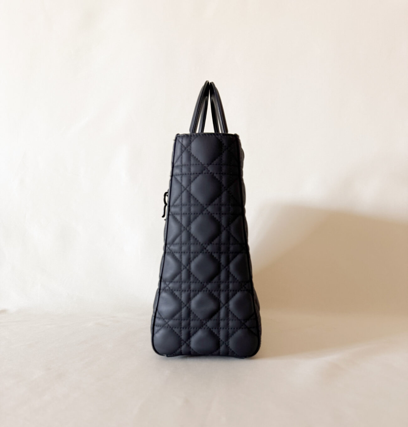 Lady Dior large ultra matte black bag side view