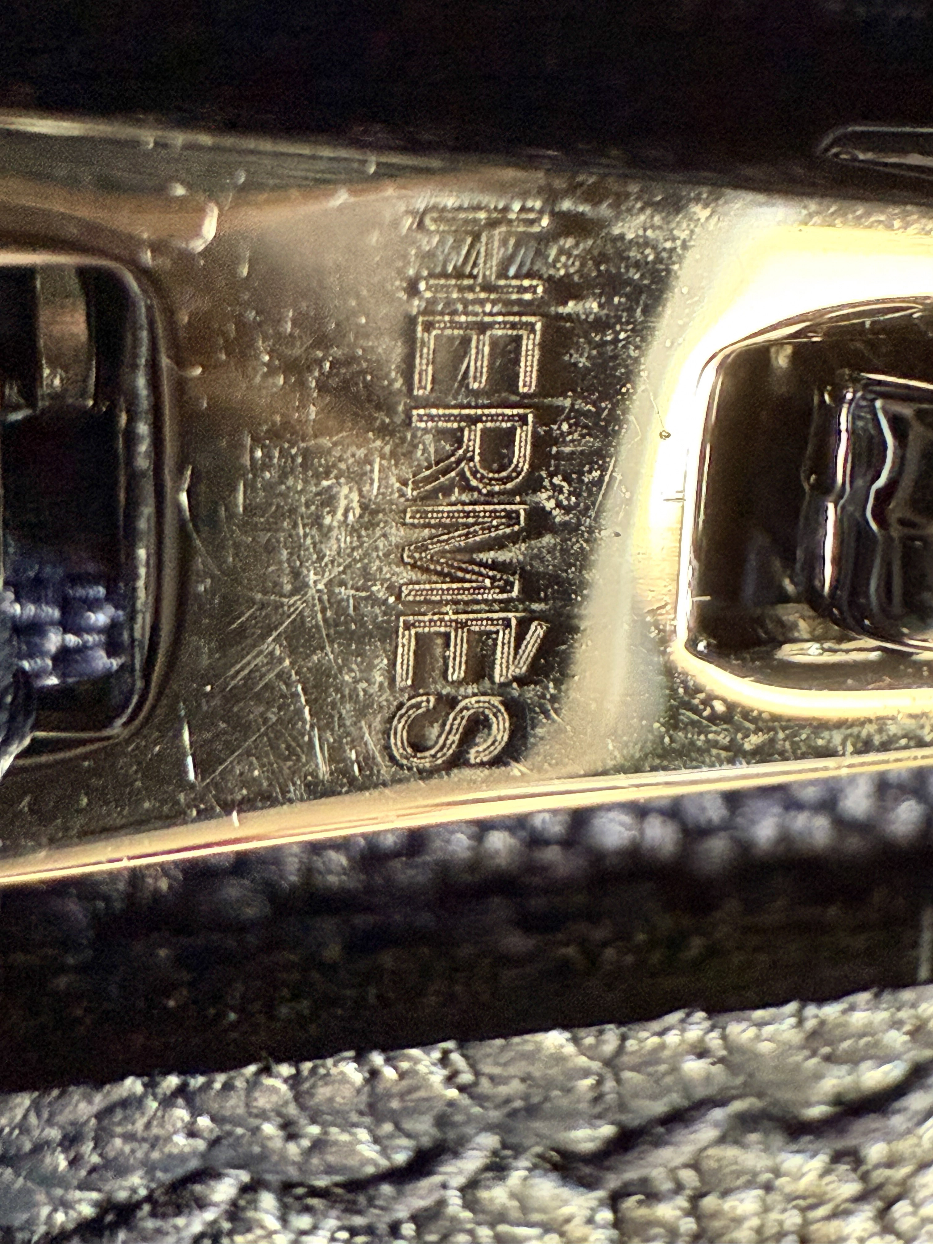 Hermès Birkin fake zipper pull engraving porous surface dot pattern lower quality detail