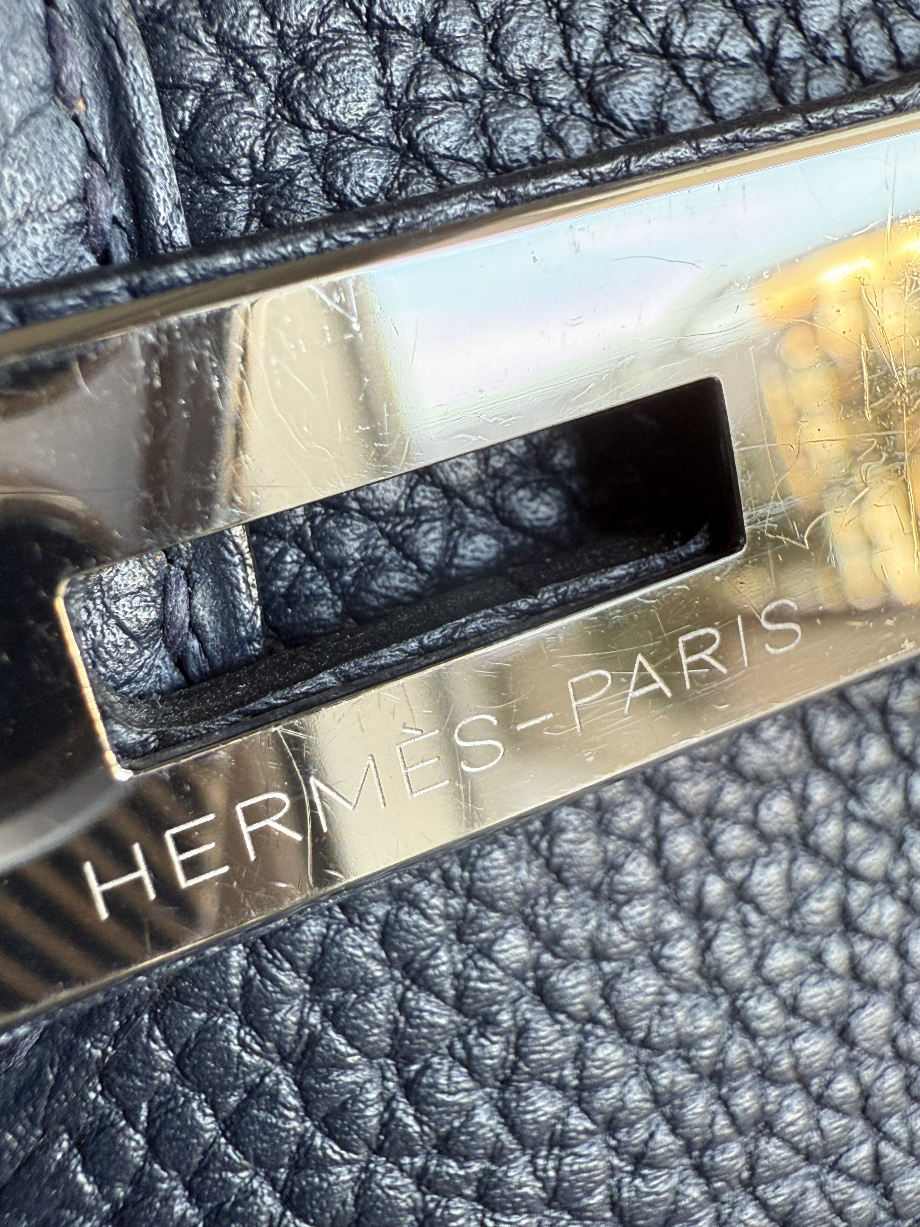 Hermès Birkin plate engraving fake bright white engraving flat overly visible surface