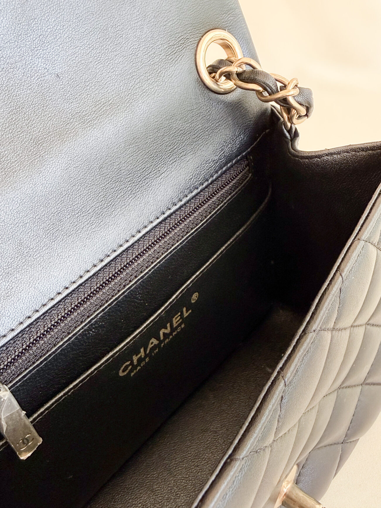 Chanel classic flap mini square black leather champagne hardware internal stamp view