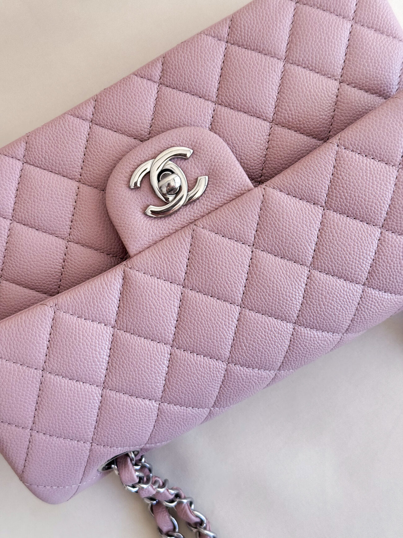 Chanel classic flap rose caviar leather palladium hardware top CC turnlock detail