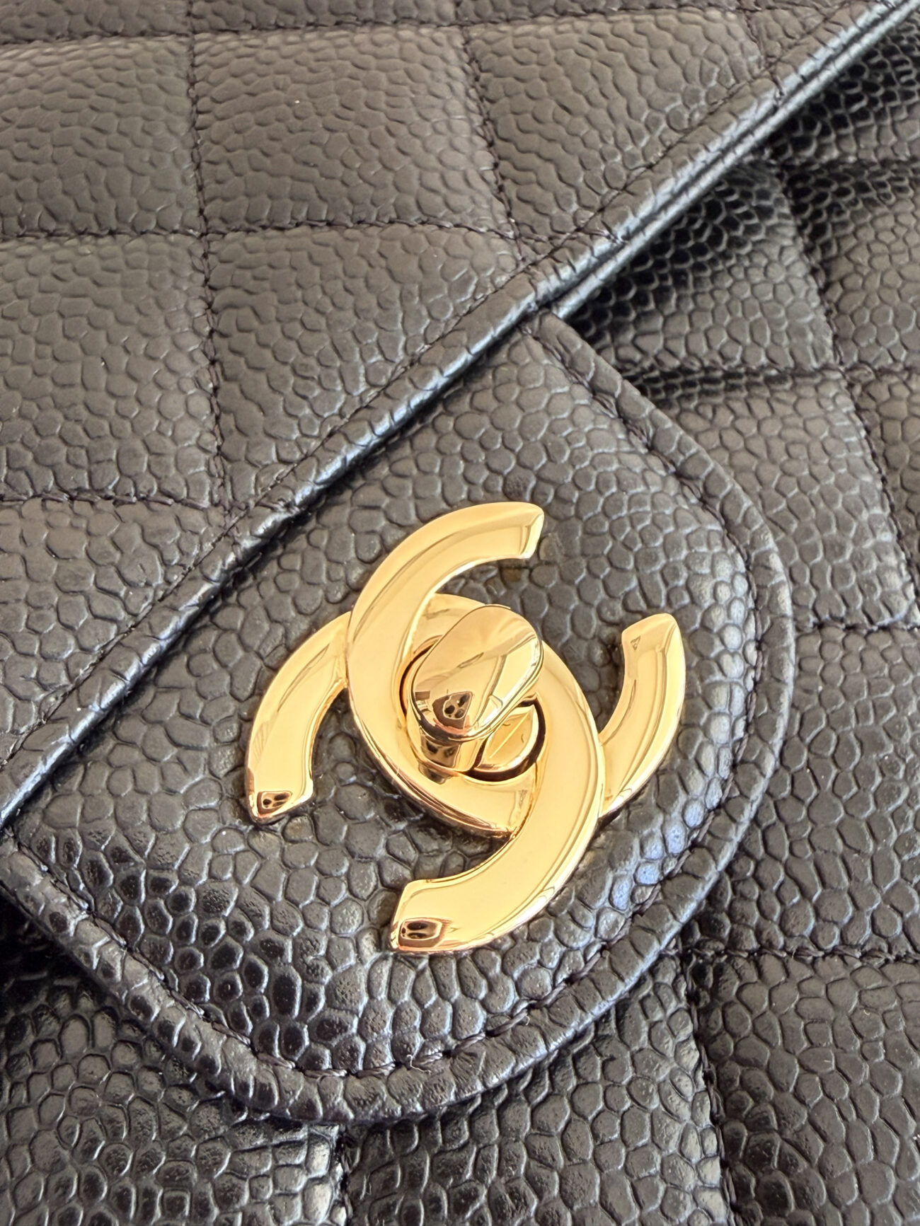 Chanel Classic Flap Medium black golg CC turnlock view