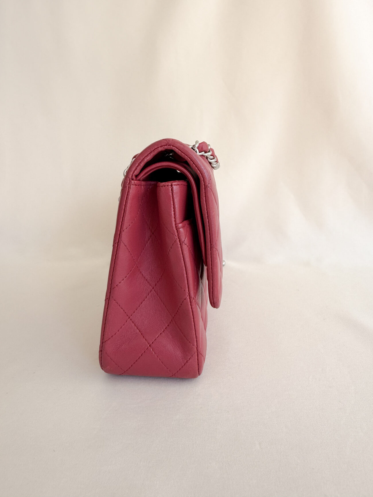 Chanel classic flap medium raspberry lambskin with palladium hardware another side view