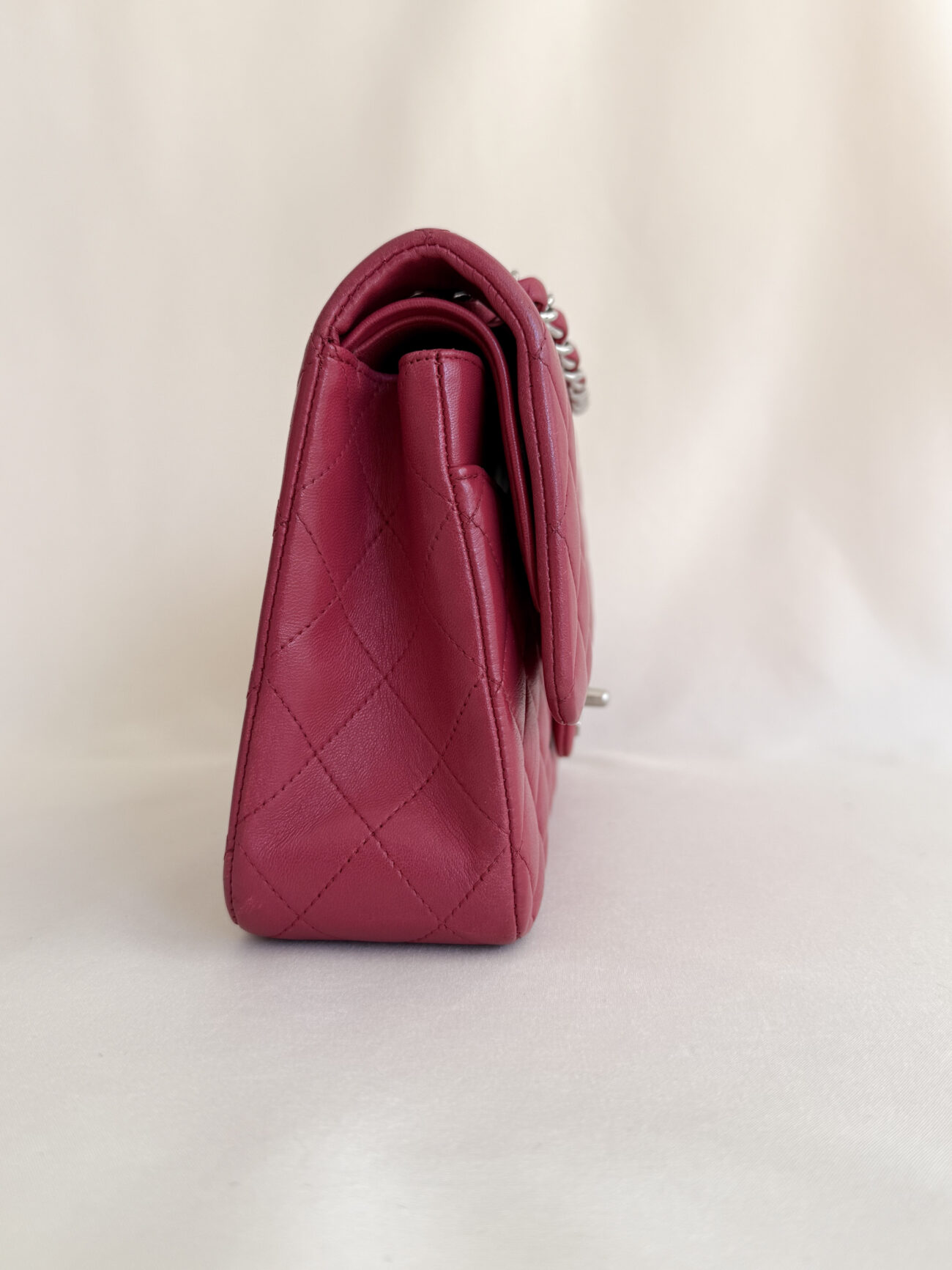 Chanel classic flap medium raspberry lambskin with palladium hardware side view
