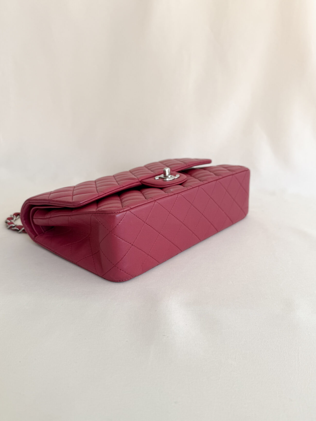 Chanel classic flap medium raspberry lambskin with palladium hardware bottom view