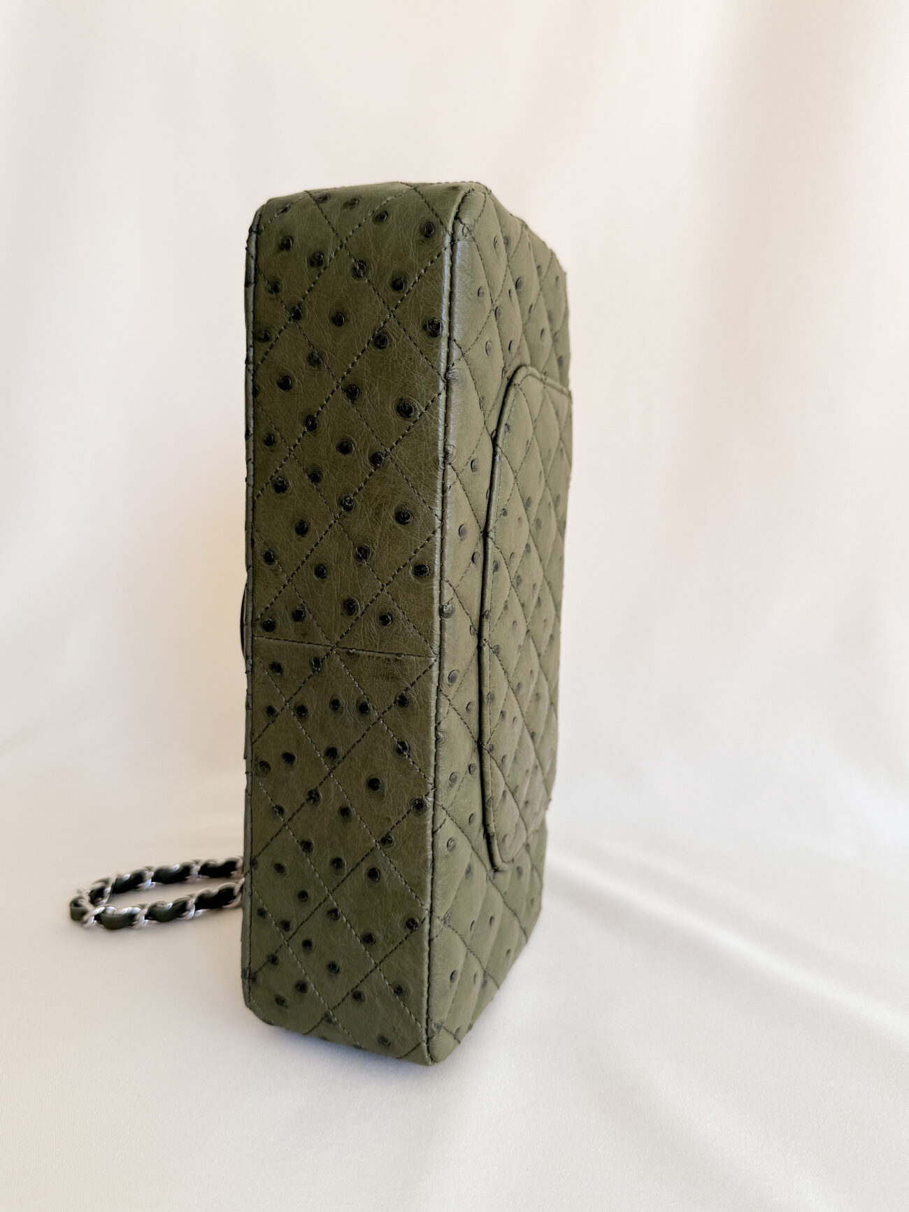 Chanel Classic Flap medium green ostrich leather palladium hardware bottom view with pocket detail