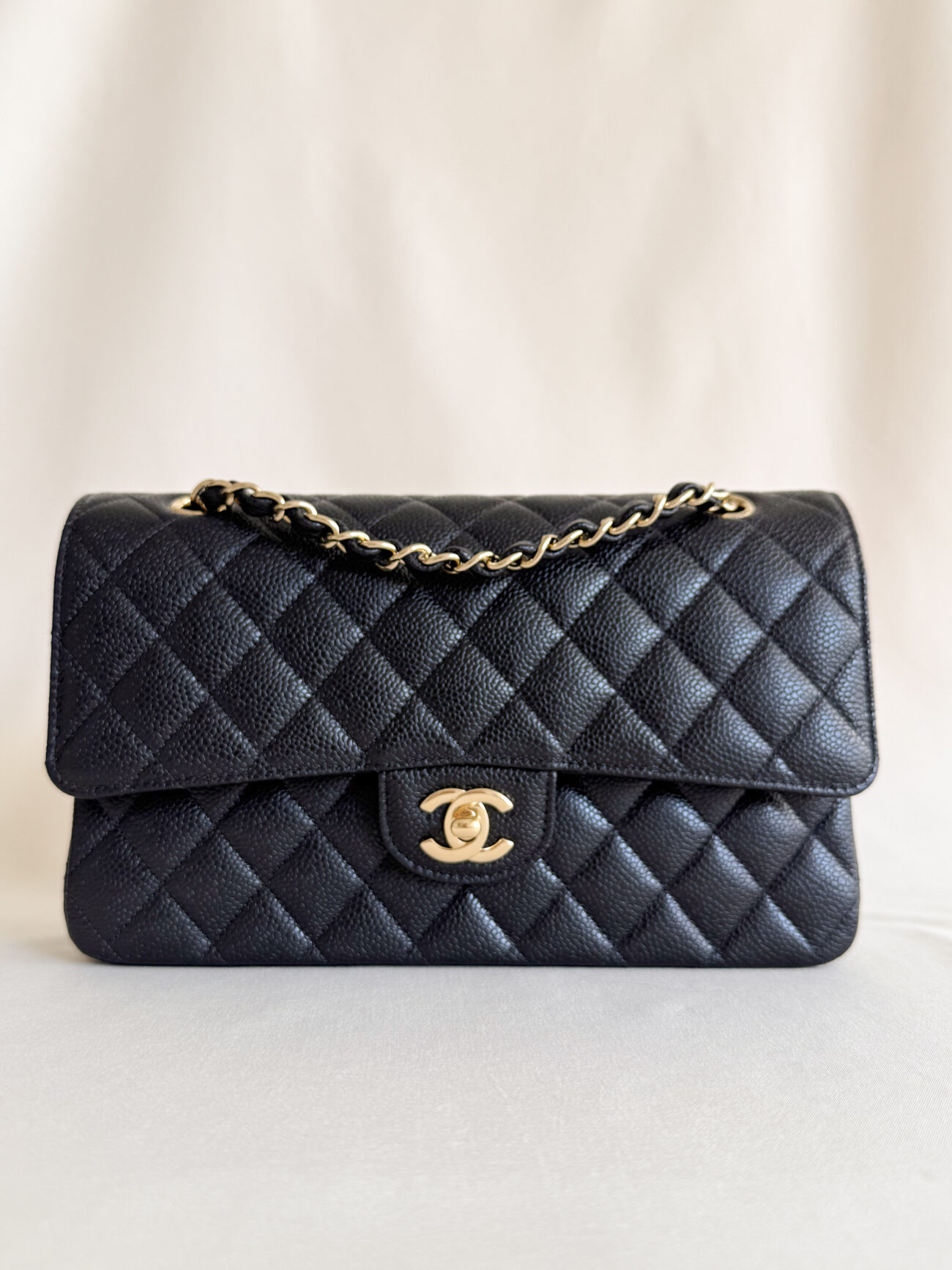 Chanel Classic Flap Medium black caviar leather front view gold hardware with chain view