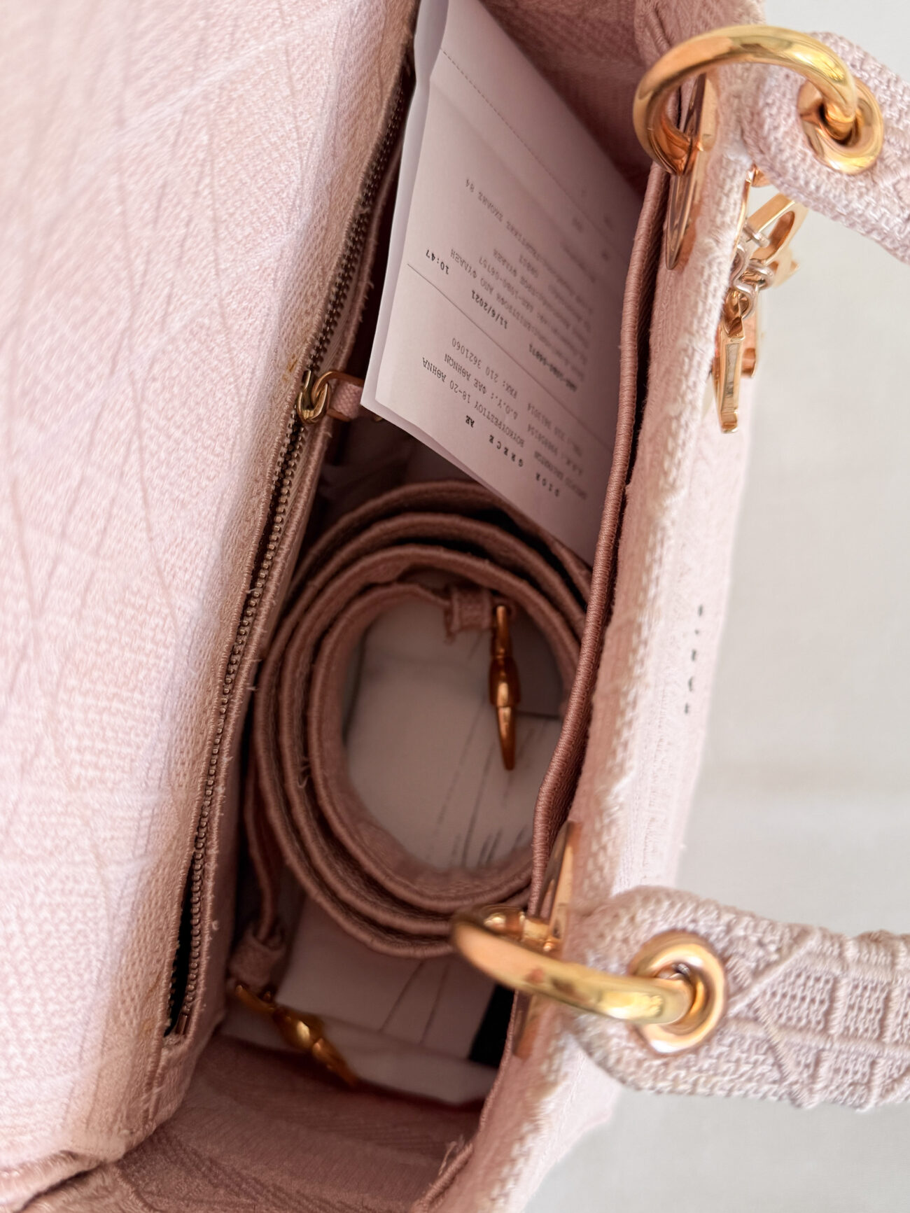 Lady Dior D-Light Small Pink embroided canvas bag rose gold hardware interior view with strap detail