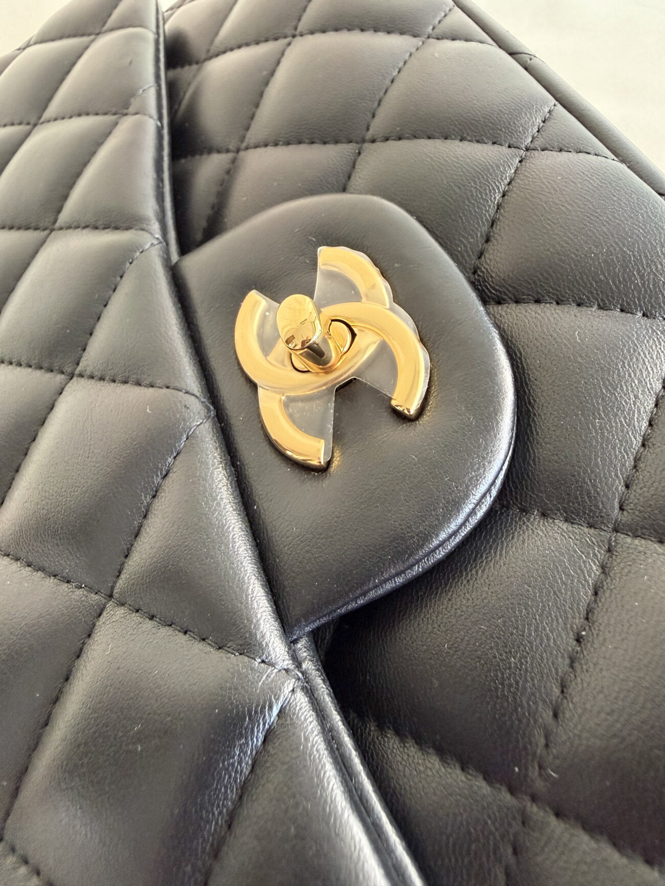 Chanel classic flap jumbo CC turnlock gold hardware detail