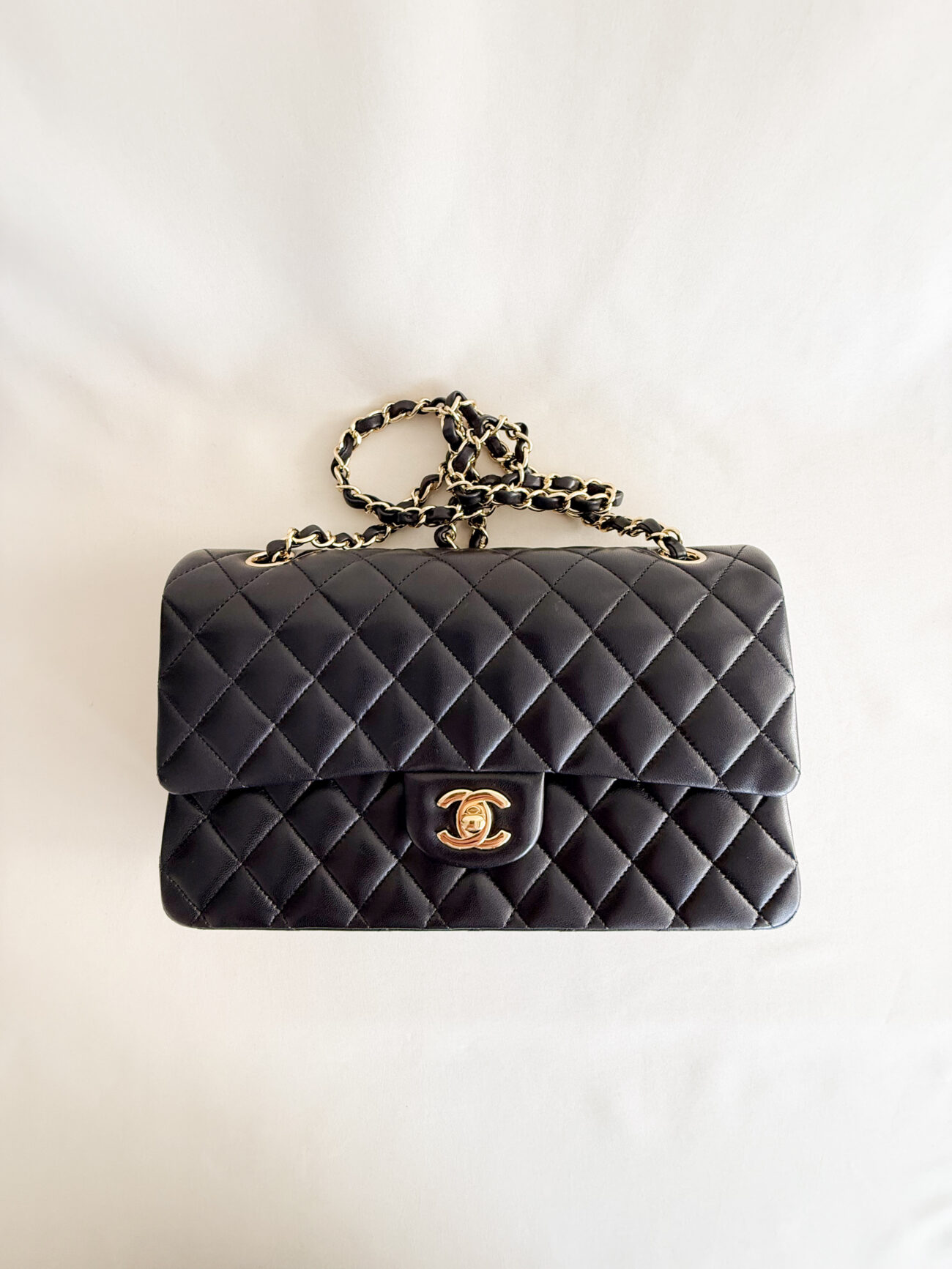 chanel classic flap medium lambskin black leather gold hardware top view
