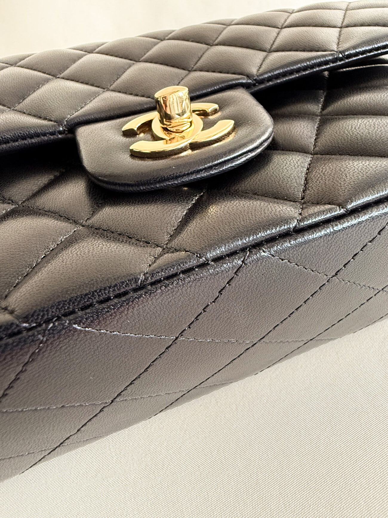 chanel classic flap medium lambskin black leather gold hardware botton with CC turnlock view view