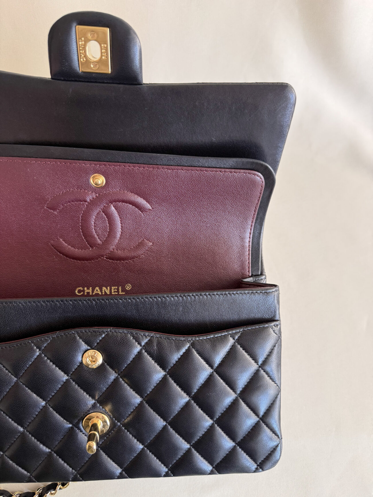 chanel classic flap medium lambskin black leather gold hardware internal flap and burgundy leather inside