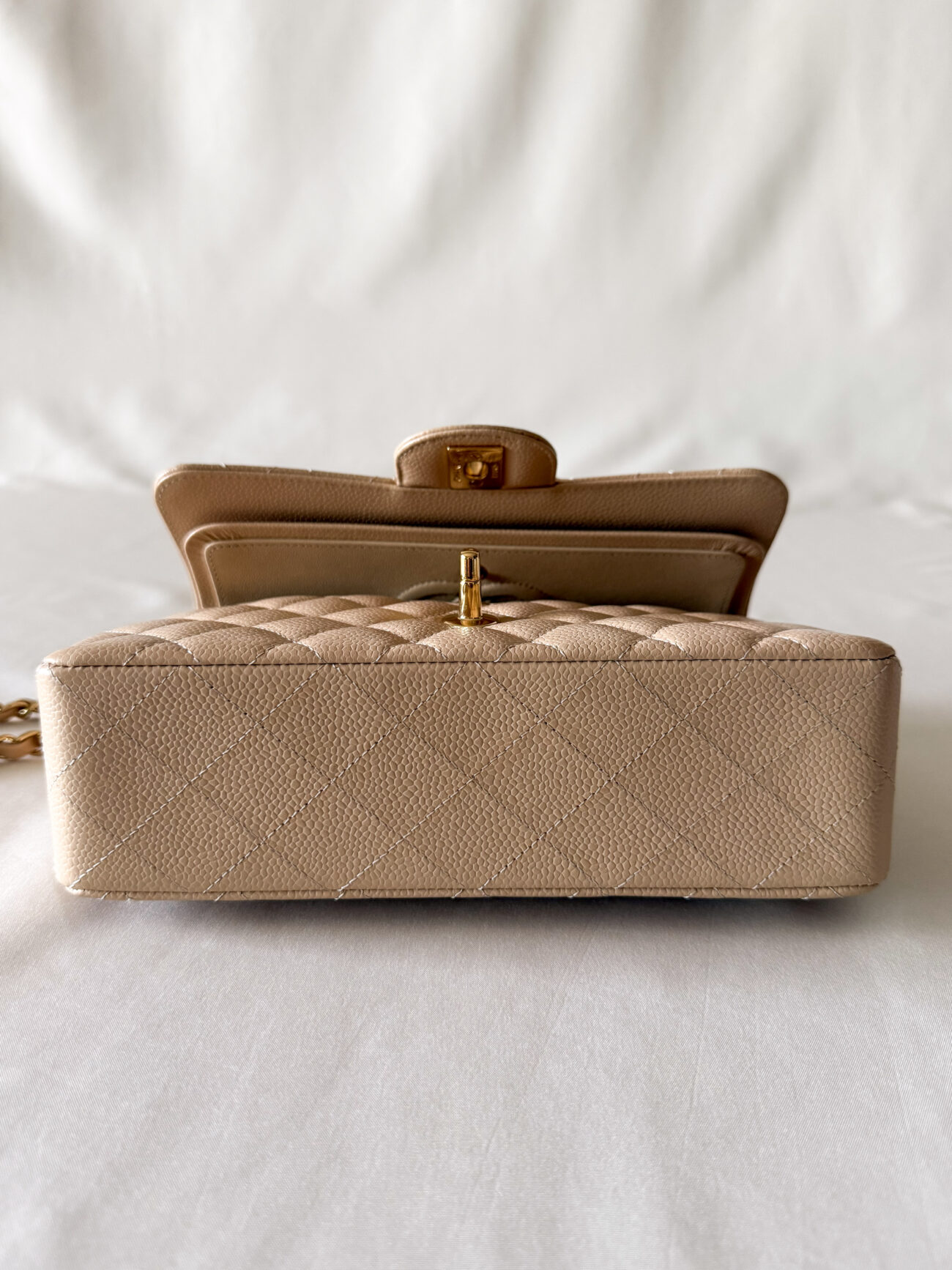 Chanel classic flap small beige caviar base vith structured form and open flap