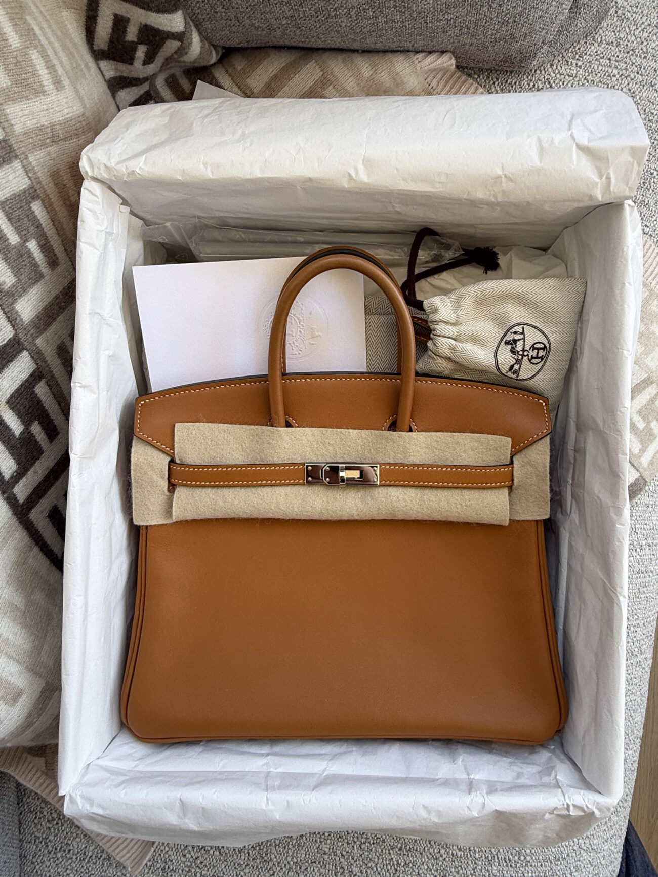 Hermes Birkin 25 in Toffee Swift leather palladium hardware packaging detail
