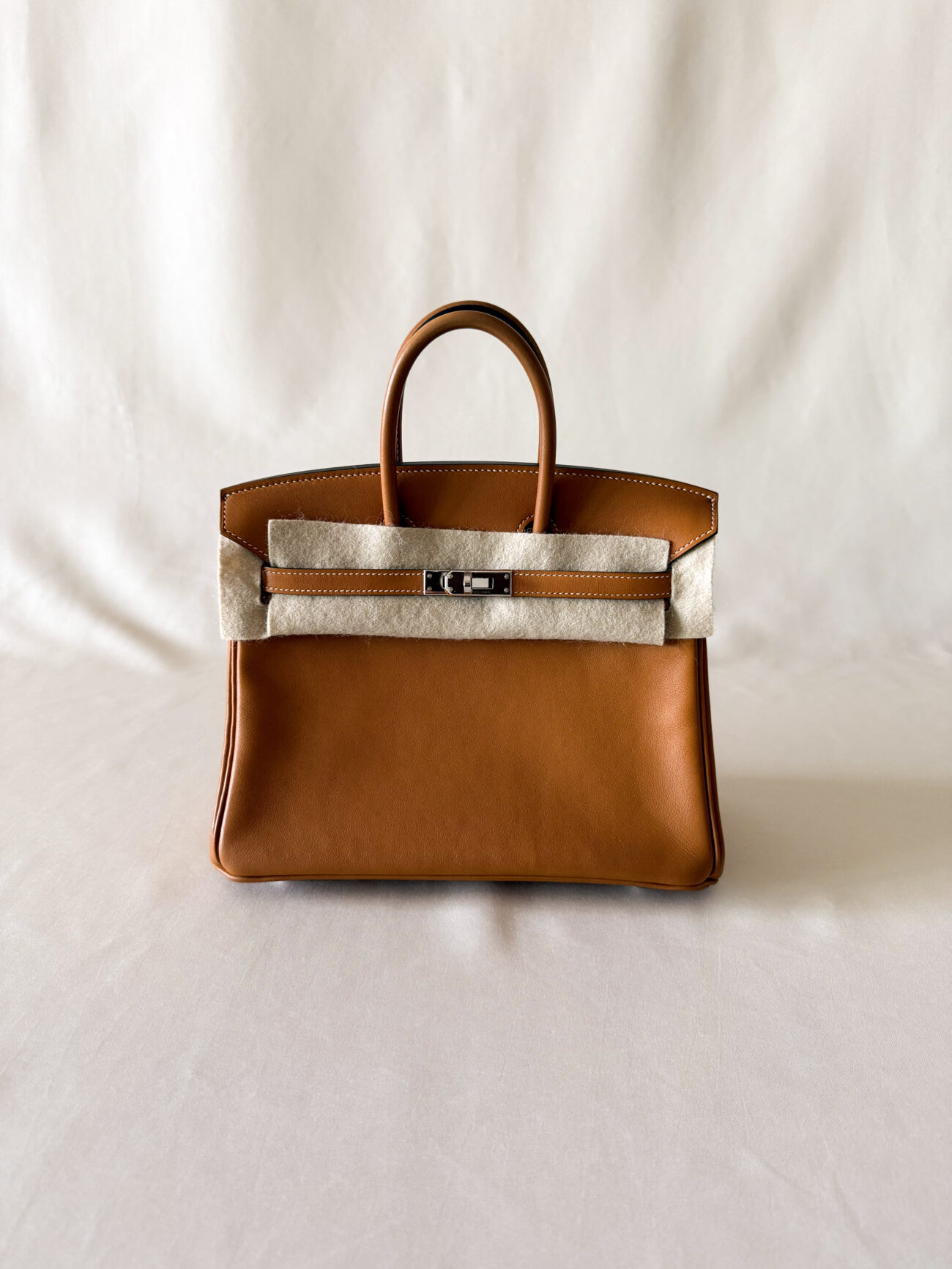 Hermes Birkin 25 in Toffee Swift leather palladium hardware front view
