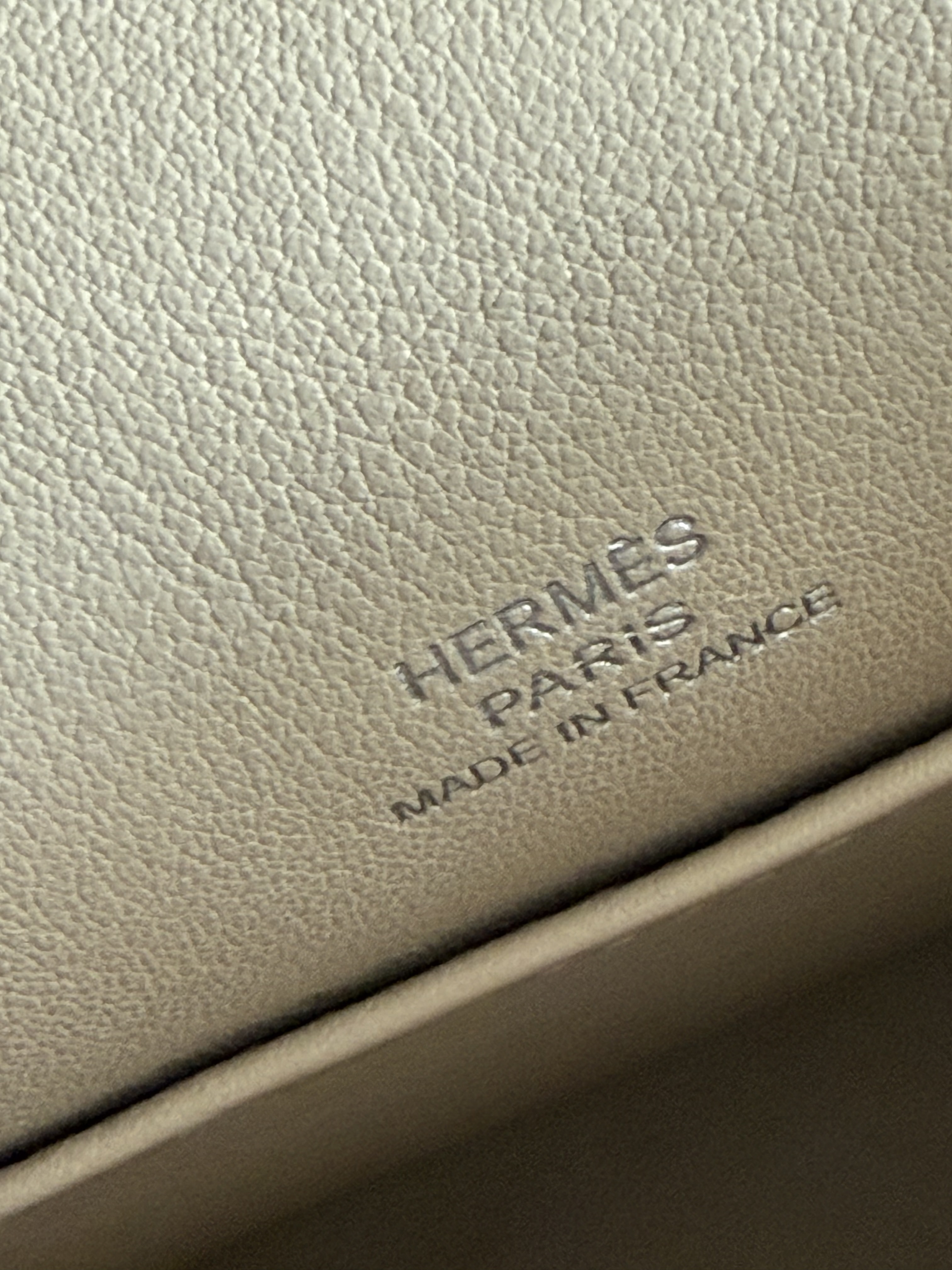 Hermès Kelly Pochette interior front stamp placement