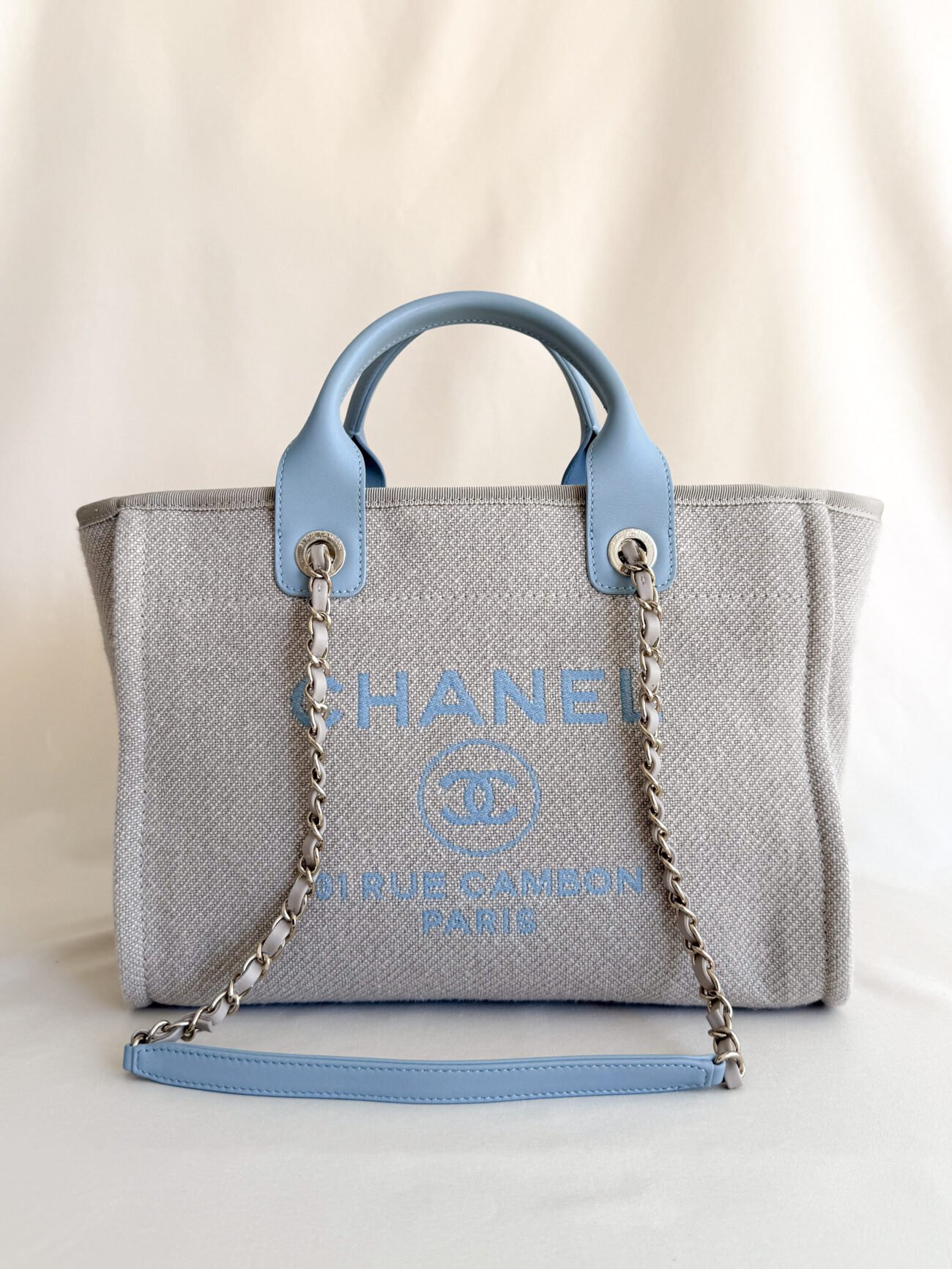 Chanel Deauville Small tote greige canvas with light blue handles and champagne hardware front view