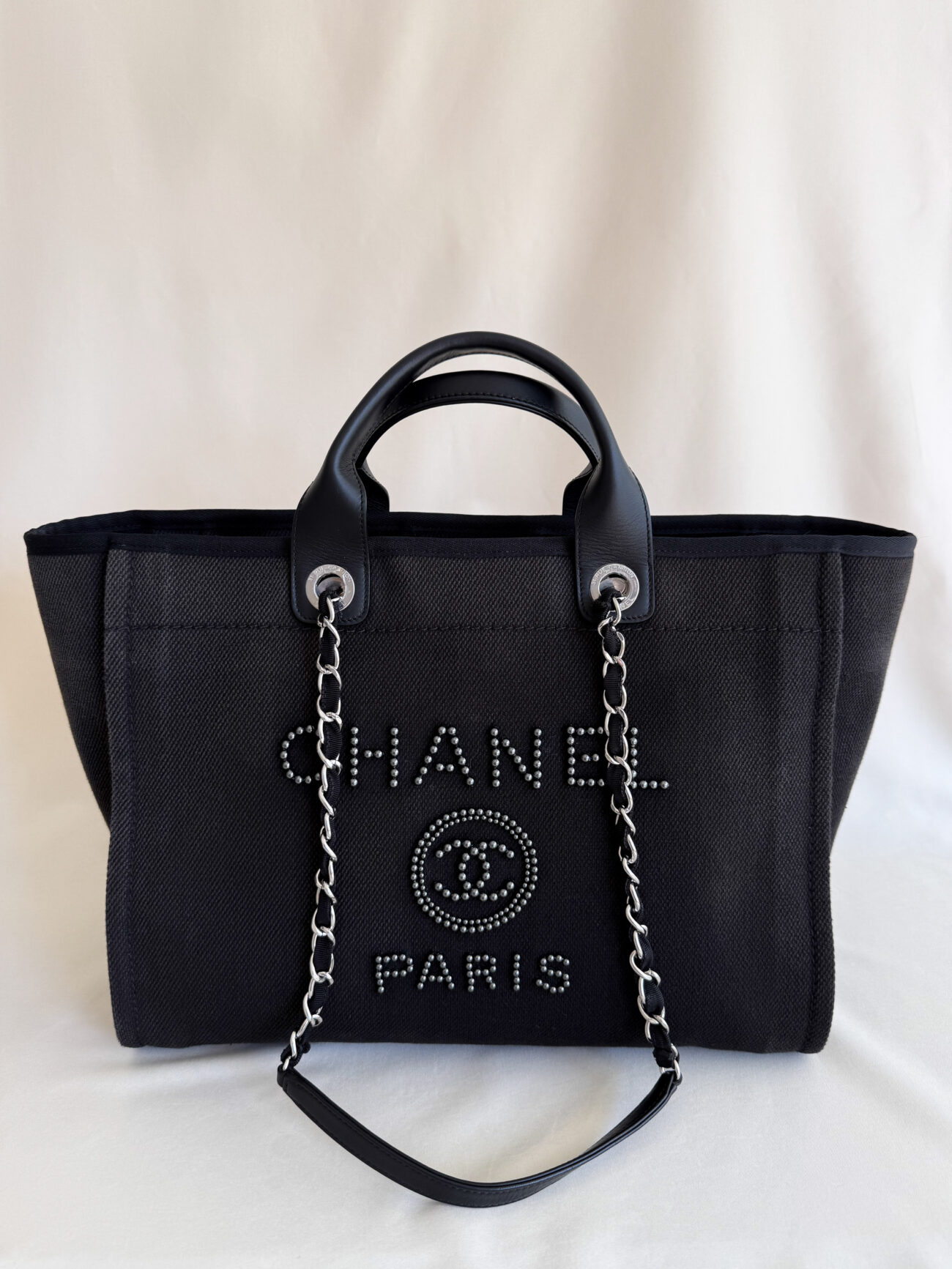 Chanel Deauville Tote Bag Large Black Canvas with pearl logo silhouette detail