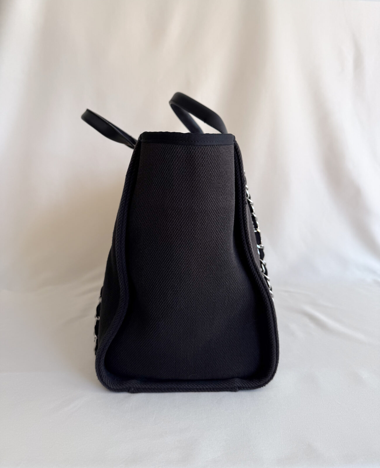 Chanel Deauville Tote Bag Large Black Canvas side profile detail