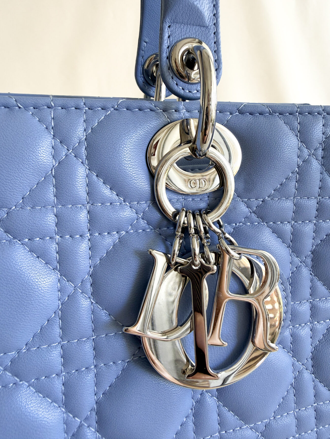 Lady Dior Large Cannage Soft Blue Lambskin with palladium hardware charmes close-up
