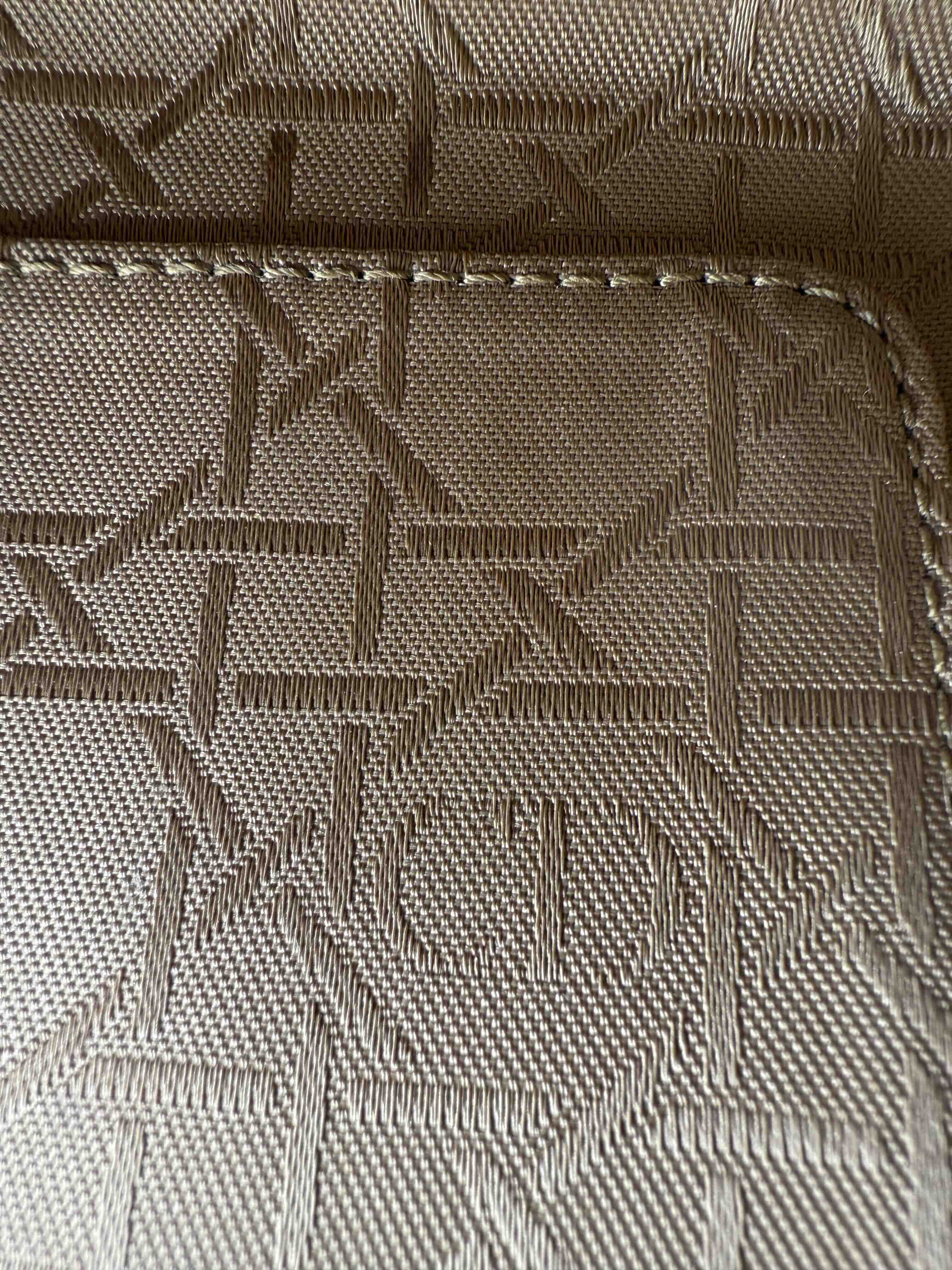 nterior jacquard lining of an authentic Lady Dior bag showing Dior Cannage pattern