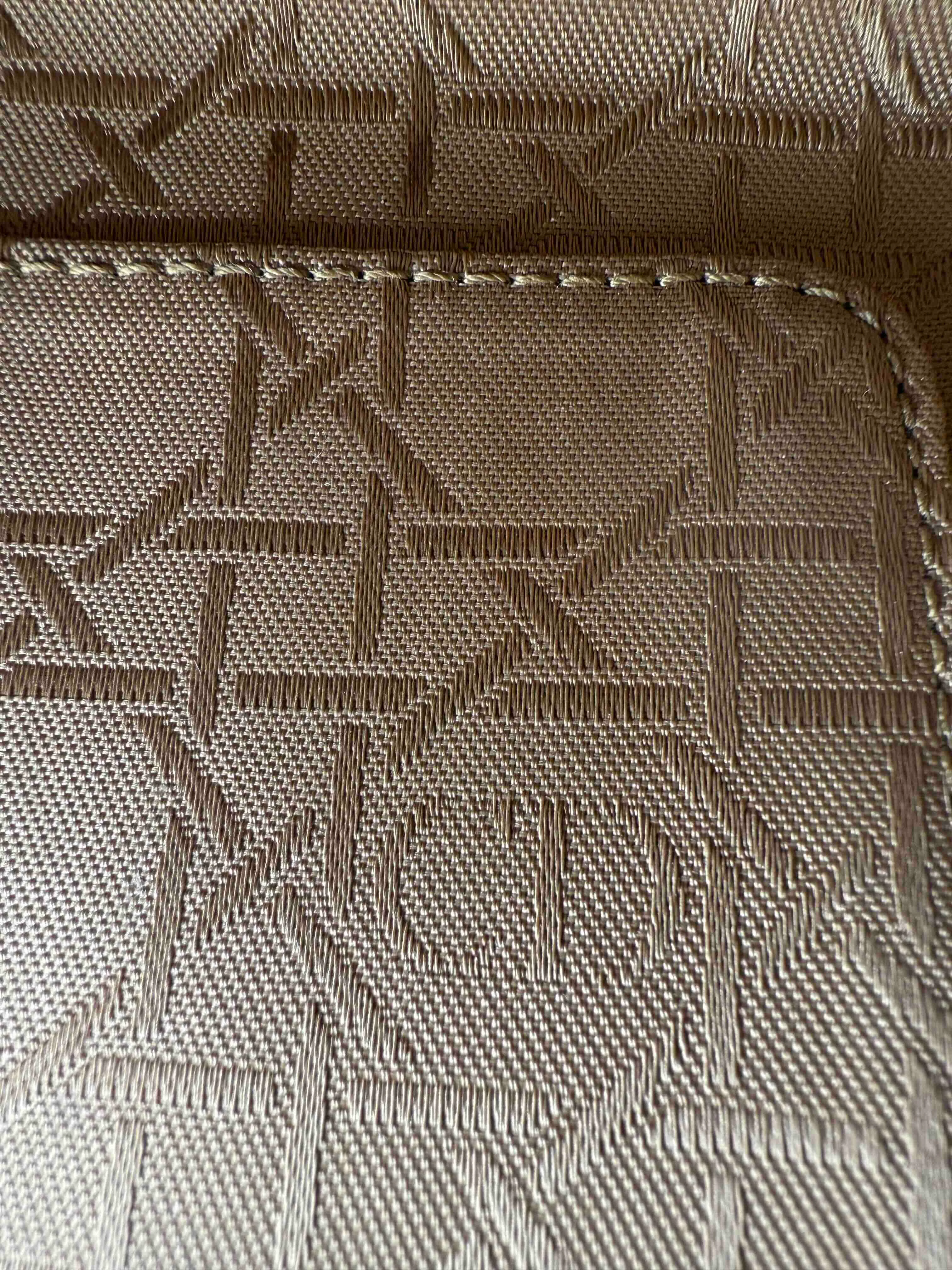 nterior jacquard lining of an authentic Lady Dior bag showing Dior Cannage pattern