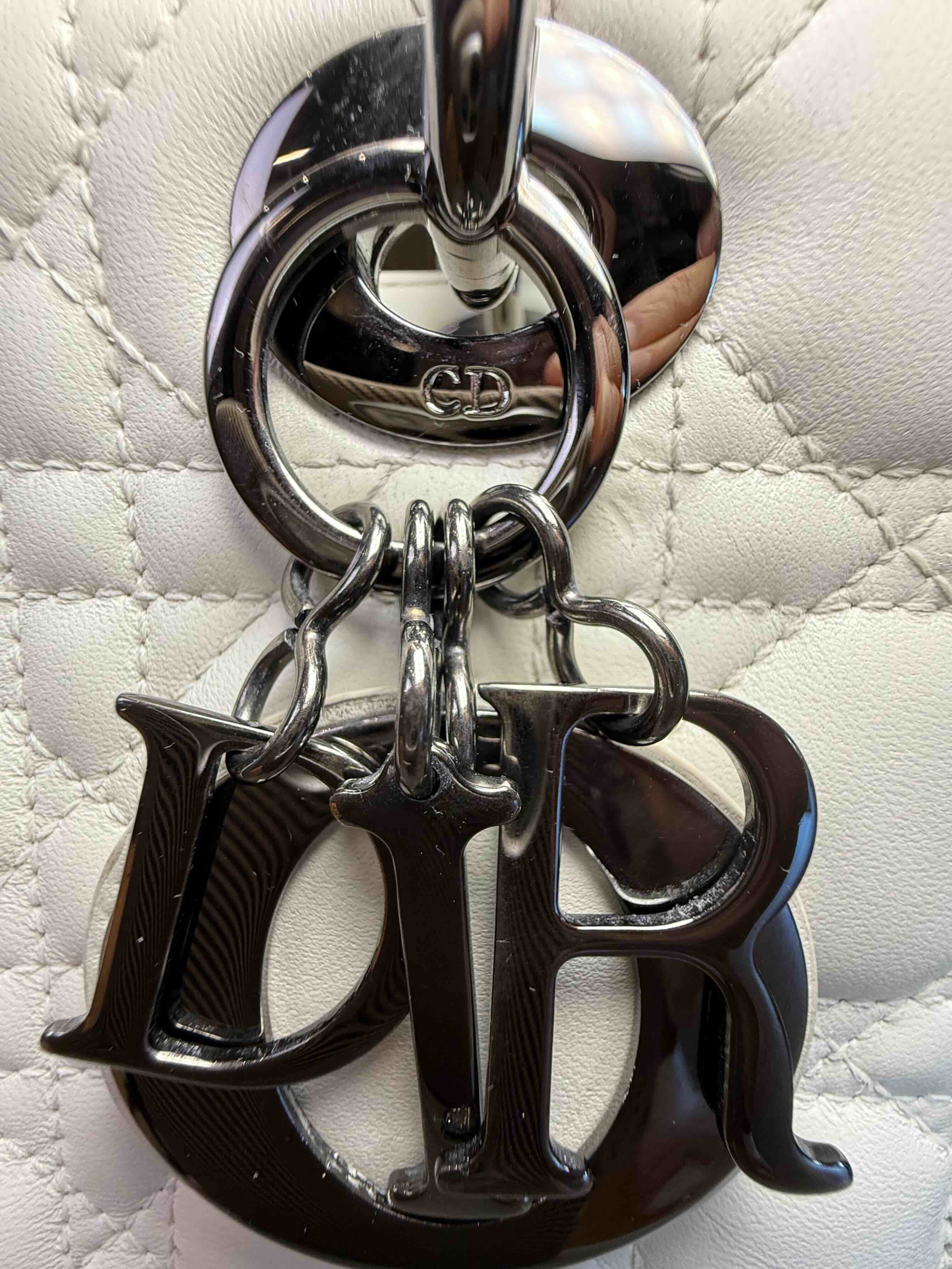 Authentic Lady Dior DIOR charms and hardware detail used for bag authentication.
