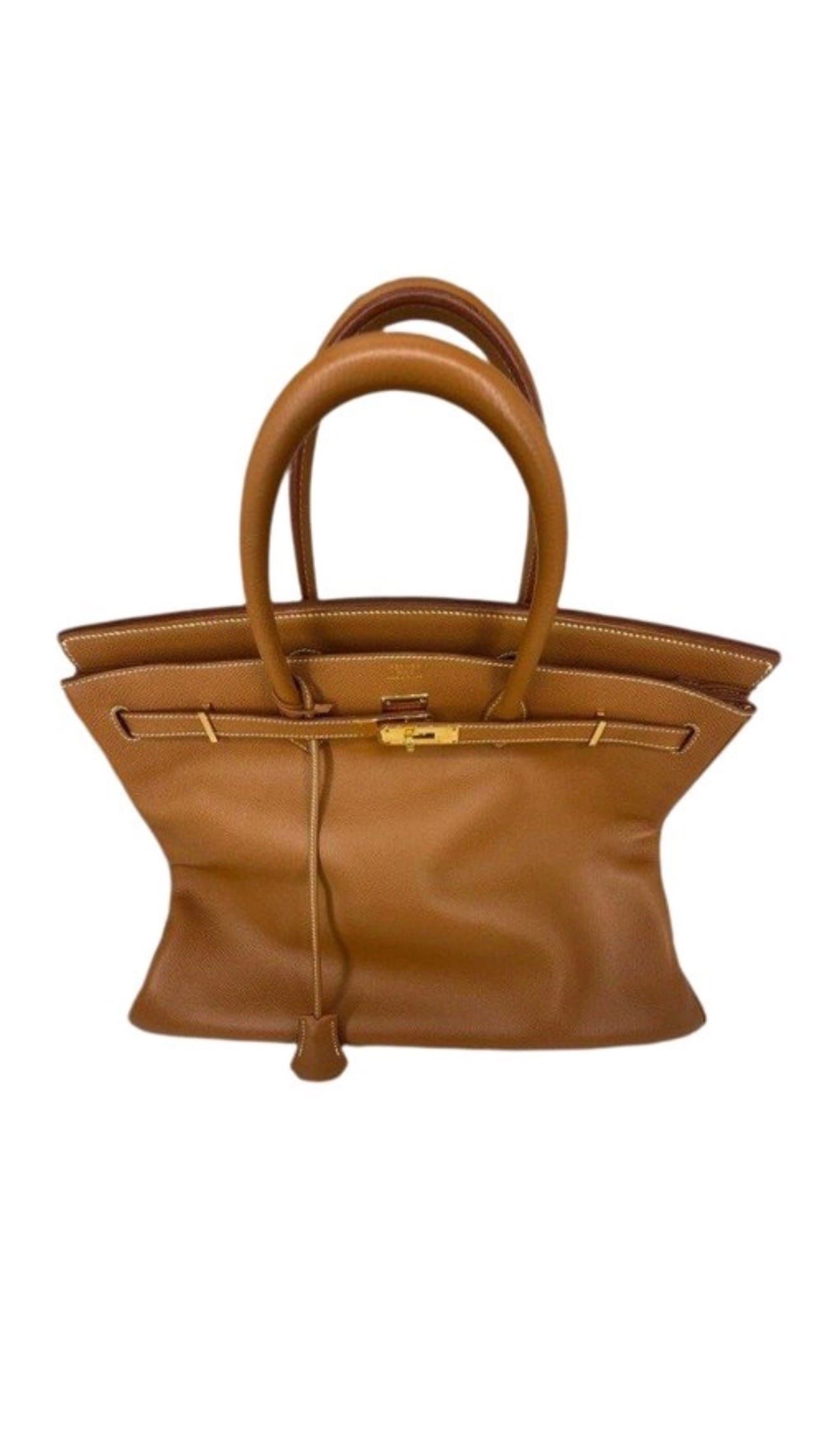 Example of leather contraction and shape changes visible on a Hermès bag stored in dry conditions