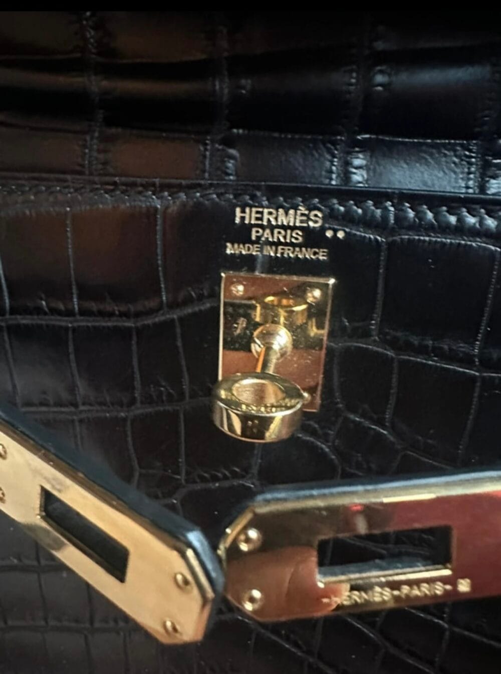 Hermès front stamp with double dot symbol identifying Crocodile Niloticus leather
