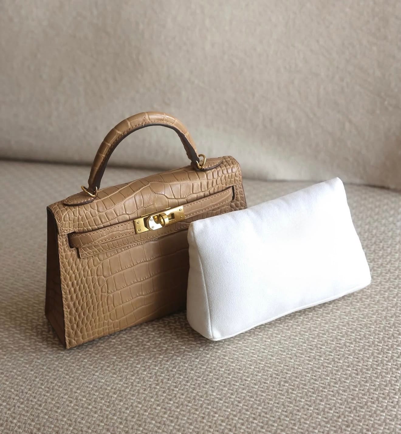 Storage pillow used to help maintain the shape of a Hermès Kelly bag during long-term storage
