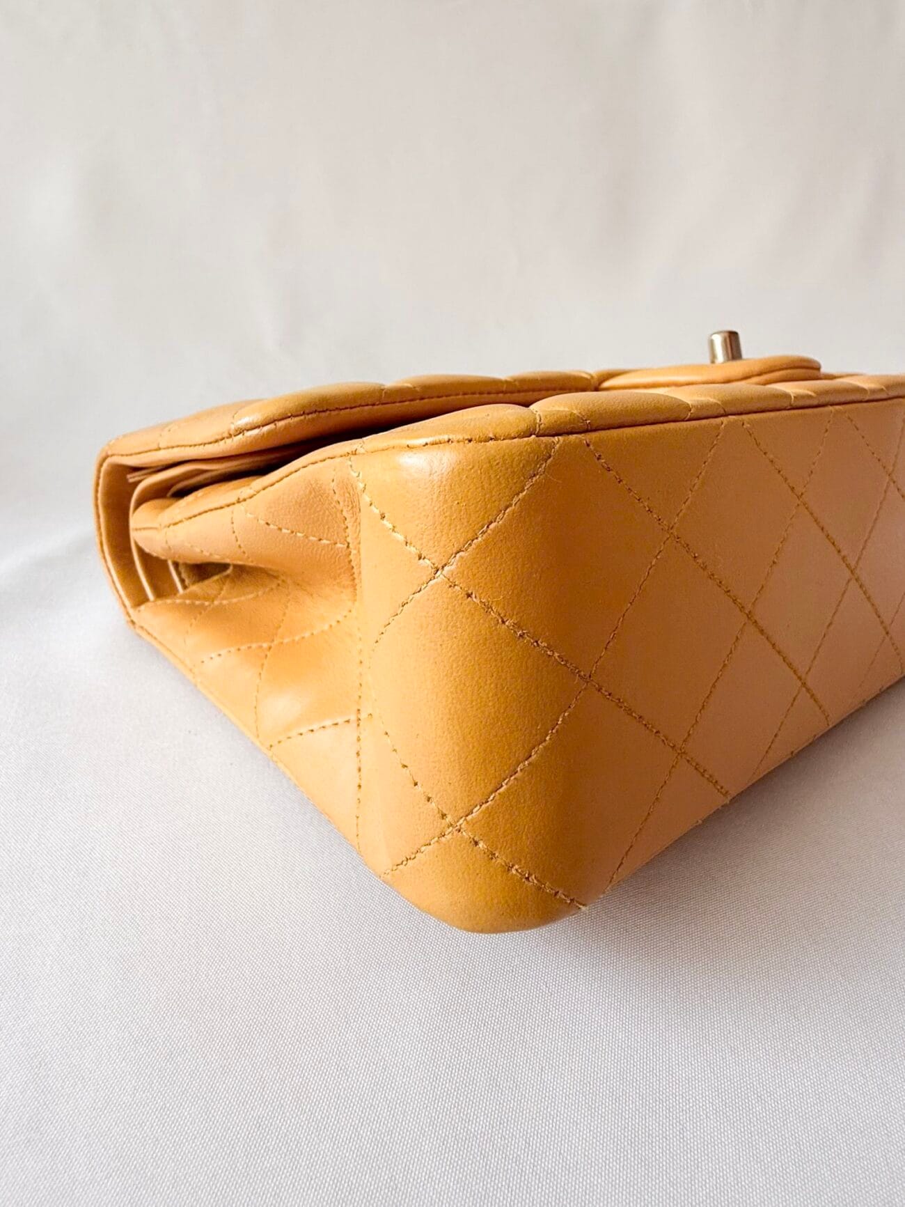 Chanel Classic Flap Medium mustard yellow lambskin bottom corner detail