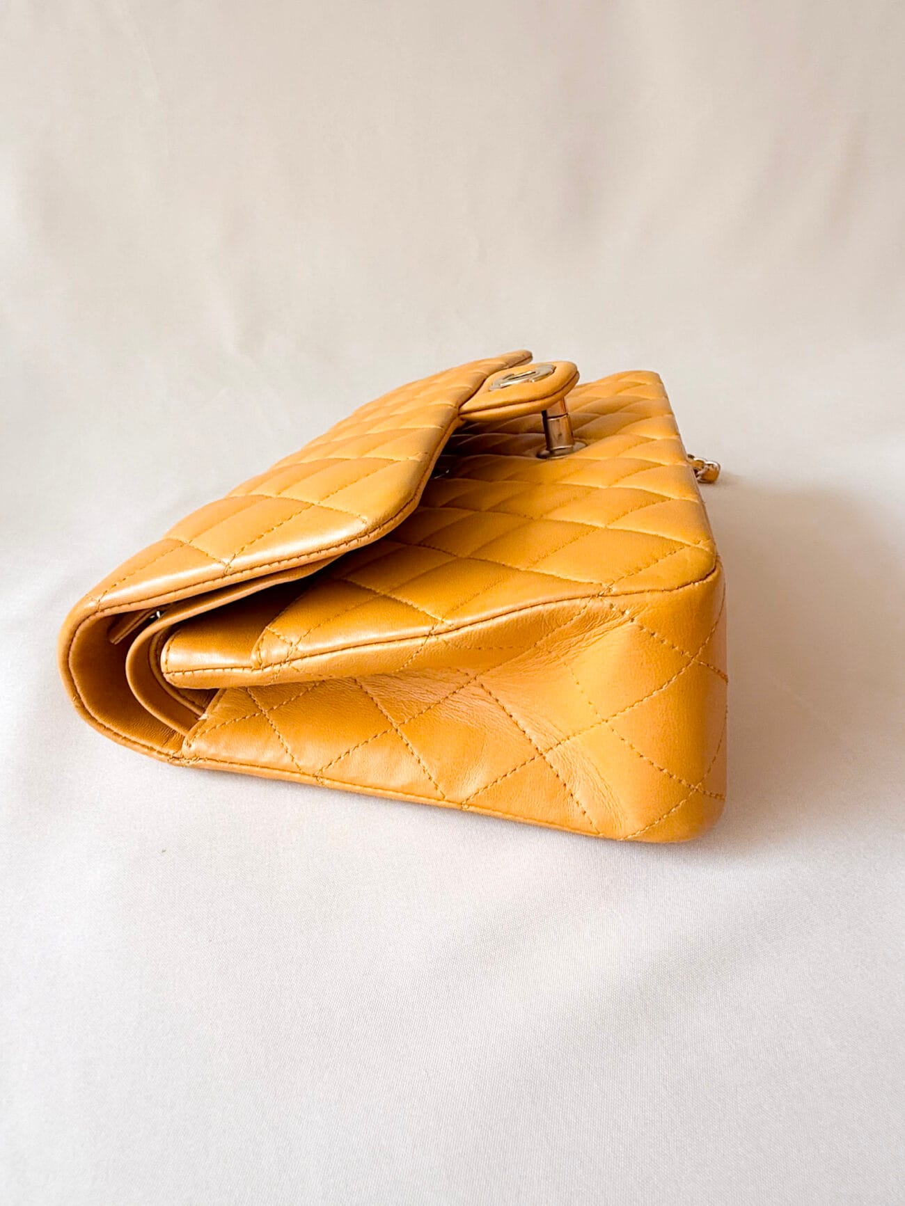 Chanel Classic Flap Medium mustard yellow lambskin side view
