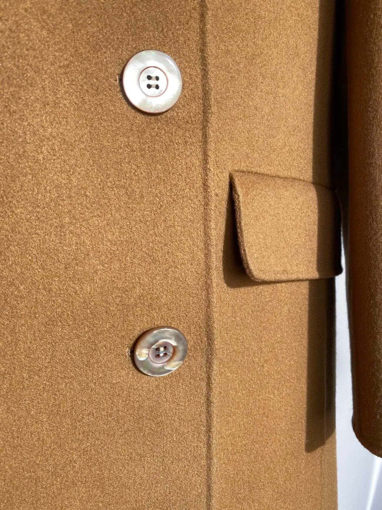 Close-up of Christian Dior camel cashmere fabric texture