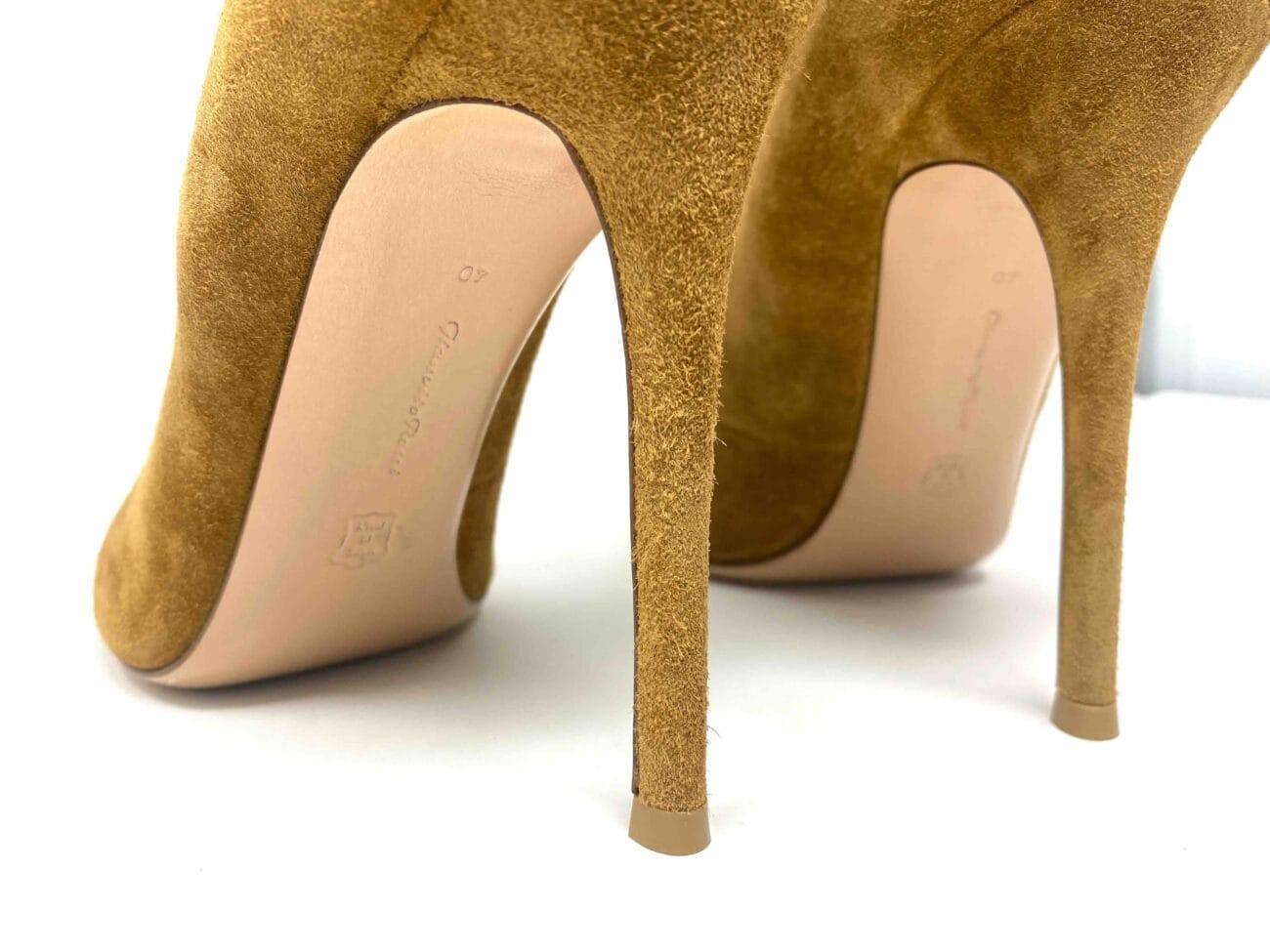 Close-up of Gianvito Rossi Vamp 105 stiletto heels in camel suede