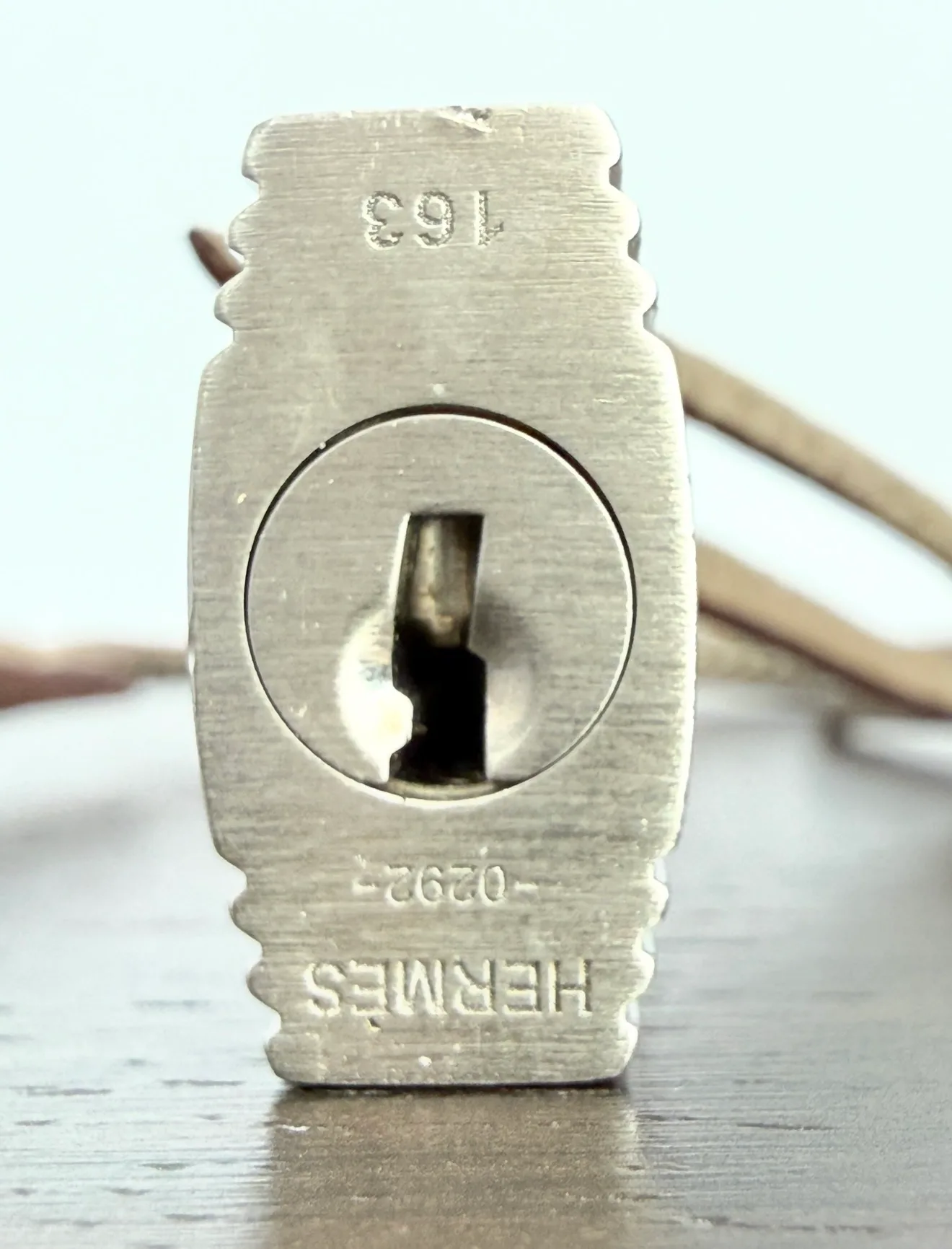 Close-up of Hermès Brushed Palladium (BPHW) lock